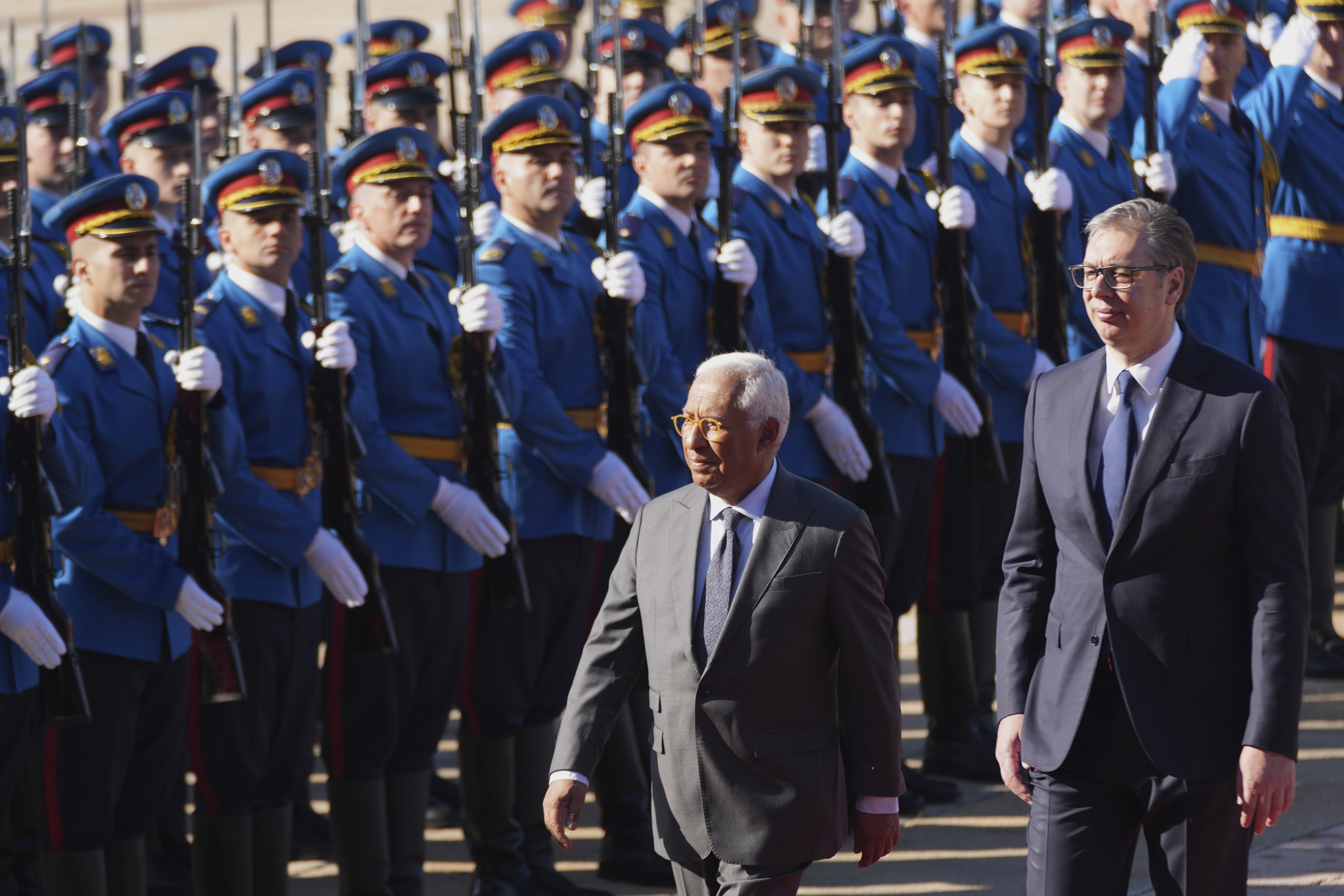 European Council President Antonio Costa, left, reviews an honor guard with Serbian President Aleksandar Vucic during a welcome ceremony at the Serbia Palace in Belgrade, Serbia, Tuesday, May 13, 2025. (AP Photo/Darko Vojinovic)