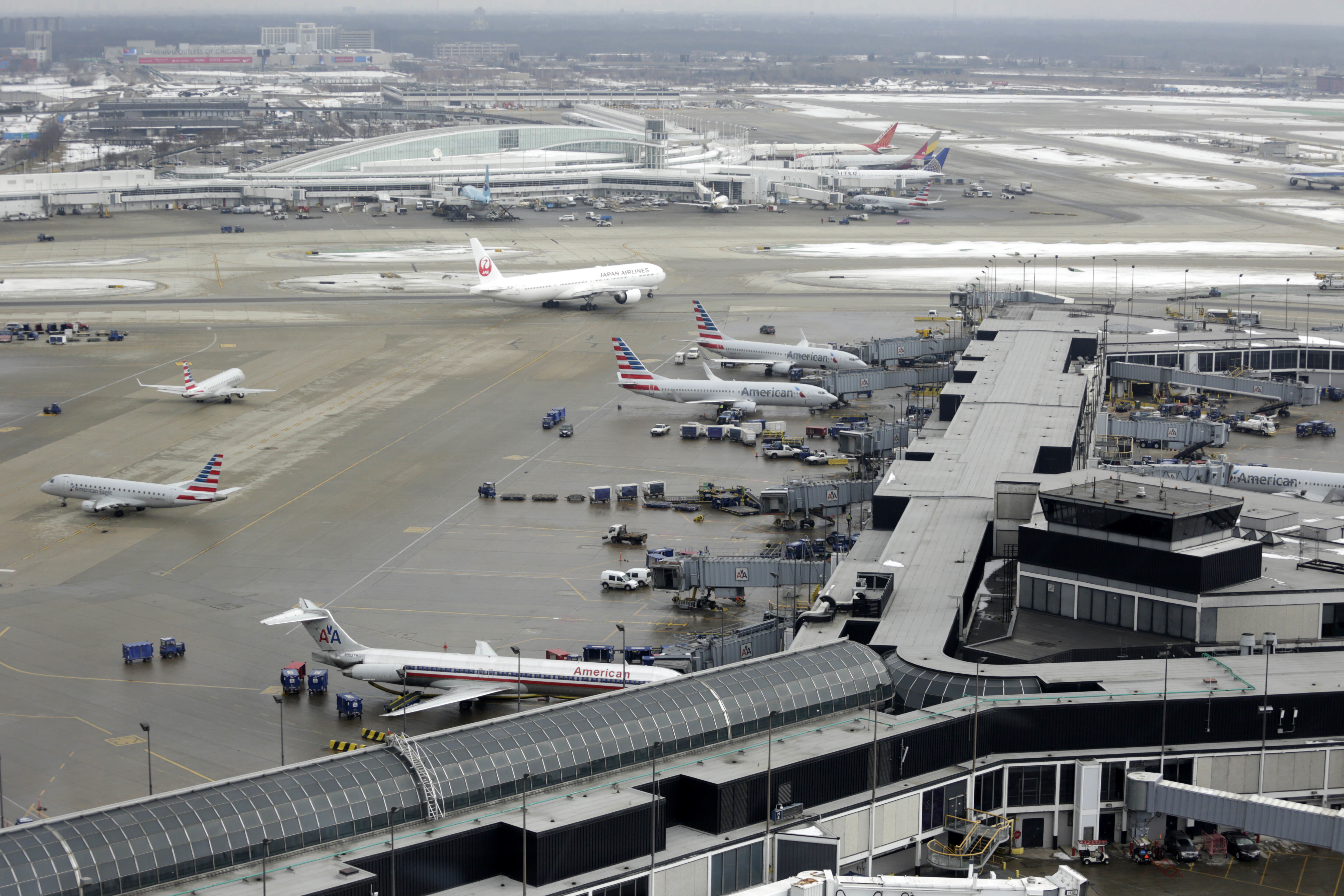 FILE - In this Feb. 11, 2015, file photo, ground traffic is seen from the control tower at O'Hare International Airport in Chicago. (AP Photo/M. Spencer Green File)