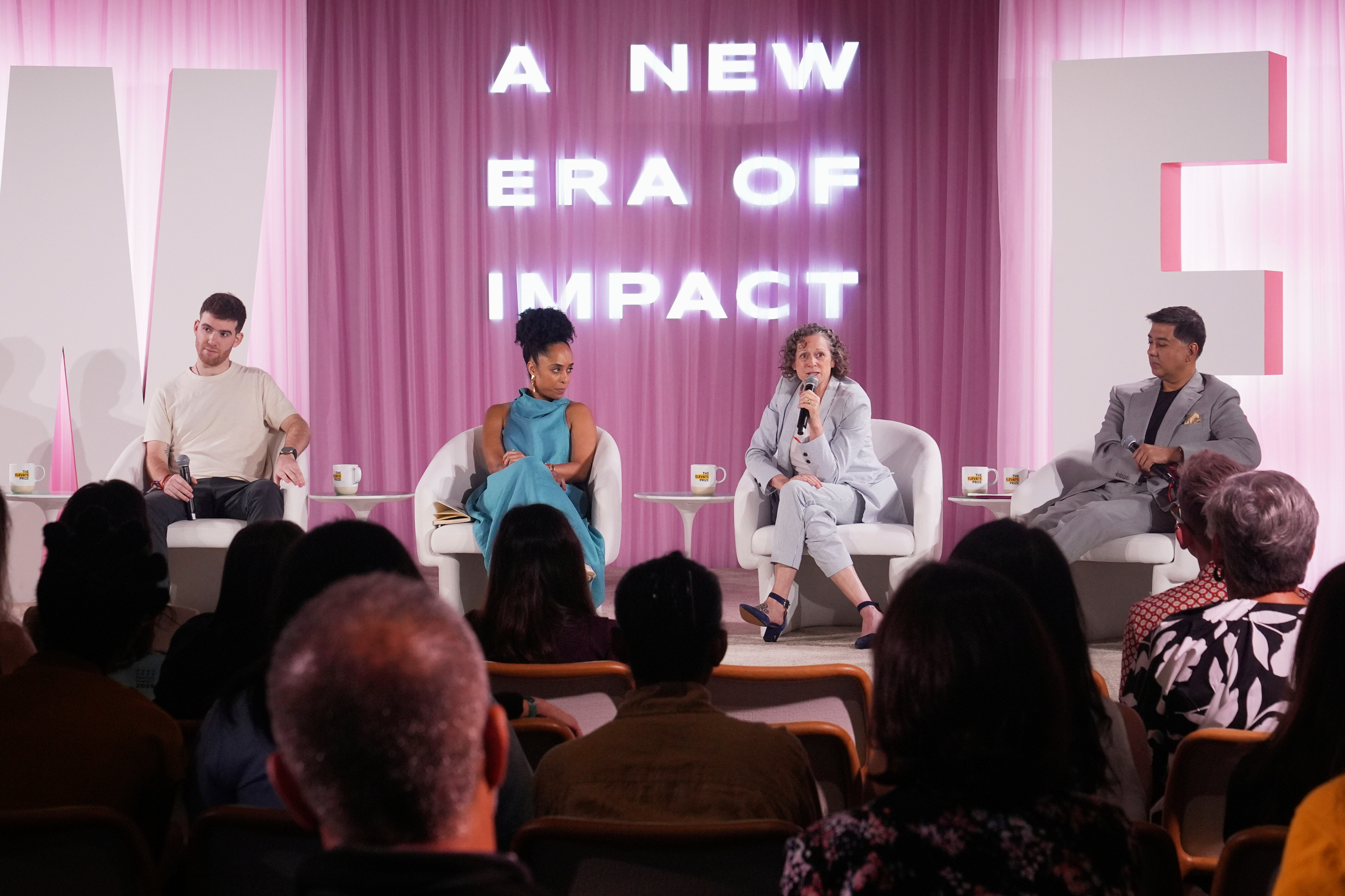 Abigail Disney, second right, speaks during The Elevate Prize Foundation's Make Good Famous Summit, Tuesday, May 13, 2025, in Miami Beach, Fla. (AP Photo/Marta Lavandier)