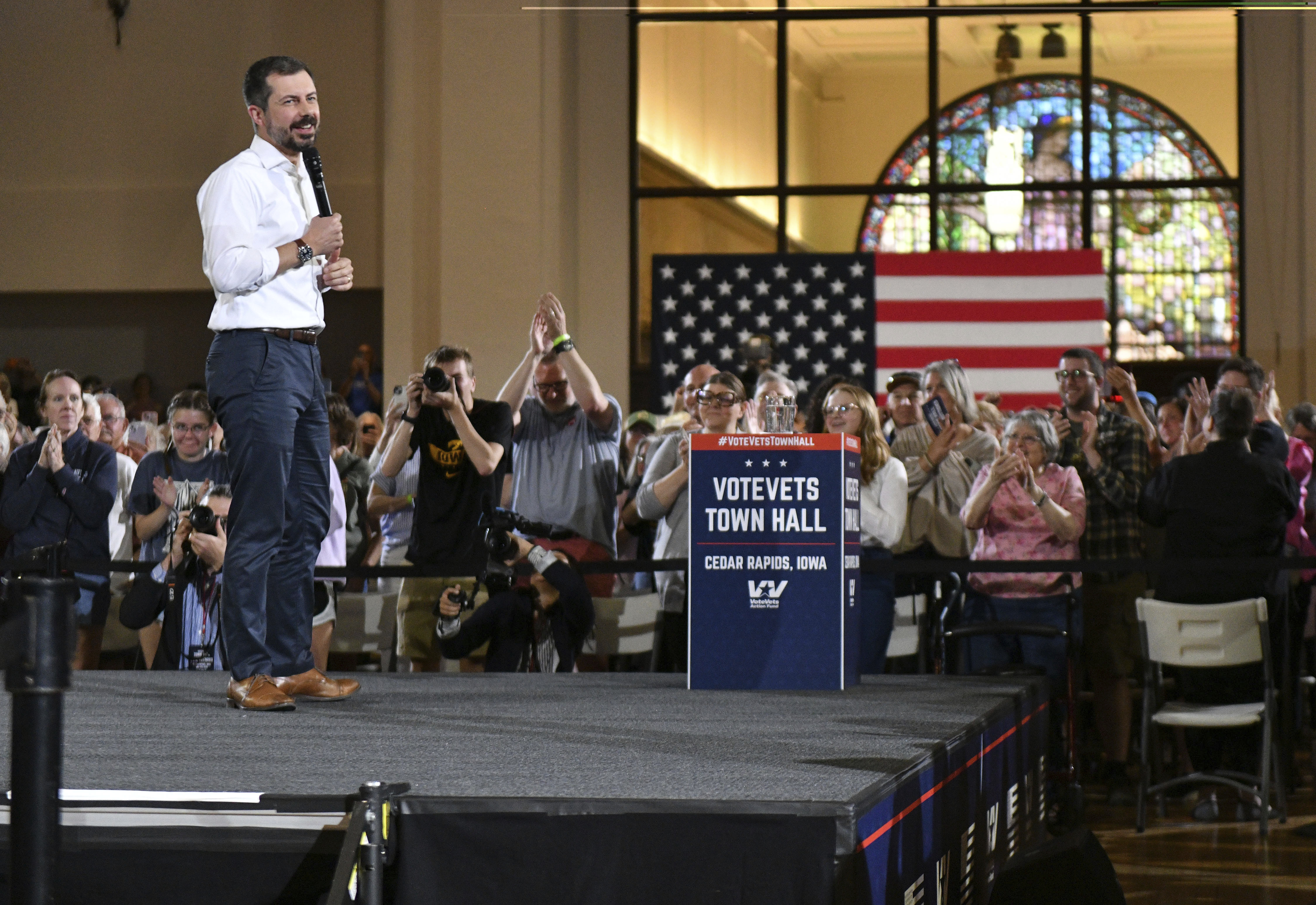 Pete Buttigieg, former transportation secretary, takes the stage during a VoteVets town hall, in Cedar Rapids, Iowa, Tuesday, May 13, 2025. (AP Photo/Cliff Jette)