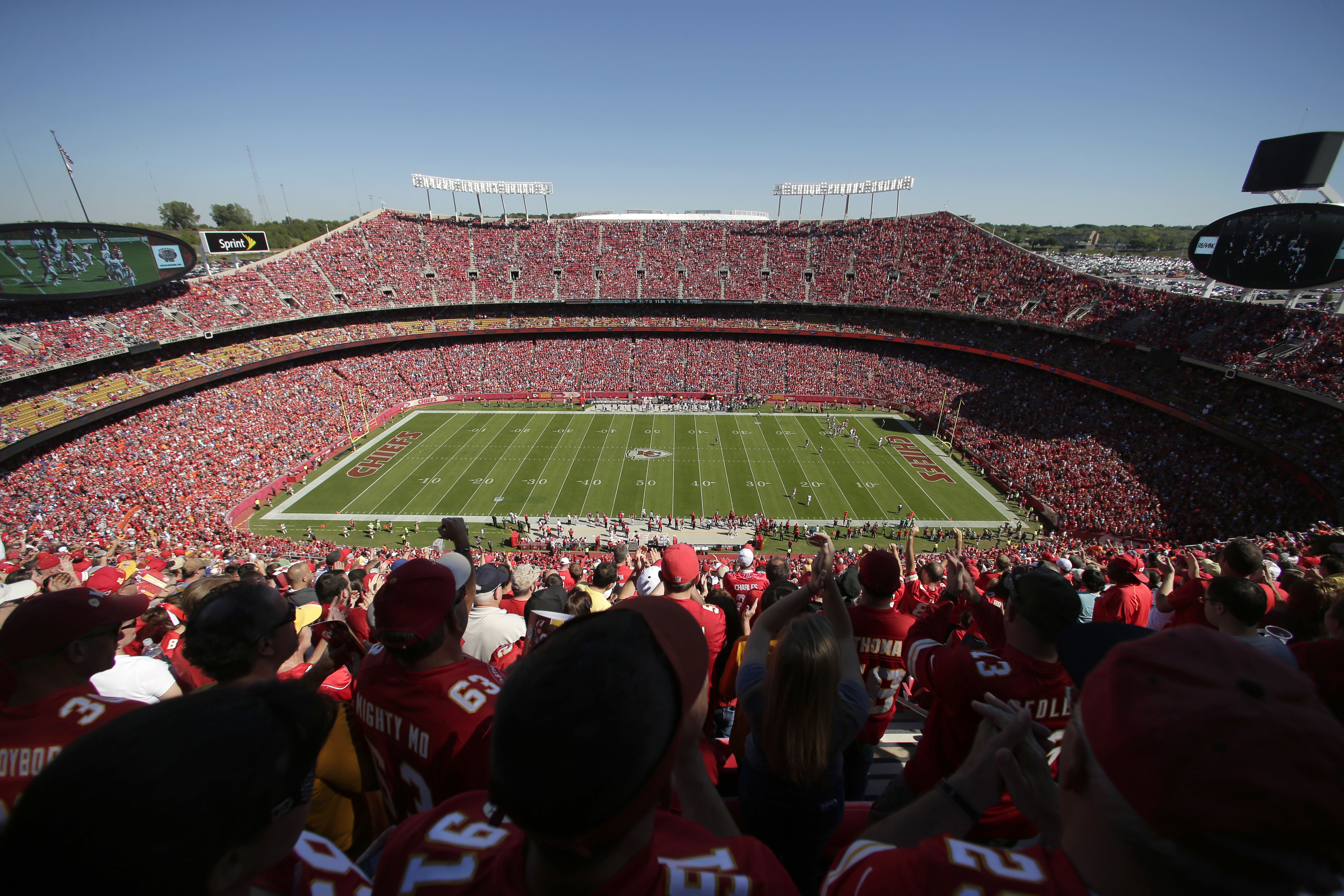FILE - Fans watch an NFL football game between the Kansas City Chiefs and the New York Giants at Arrowhead Stadium, Sept. 29, 2013, in Kansas City, Mo. (AP Photo/Charlie Riedel, file)