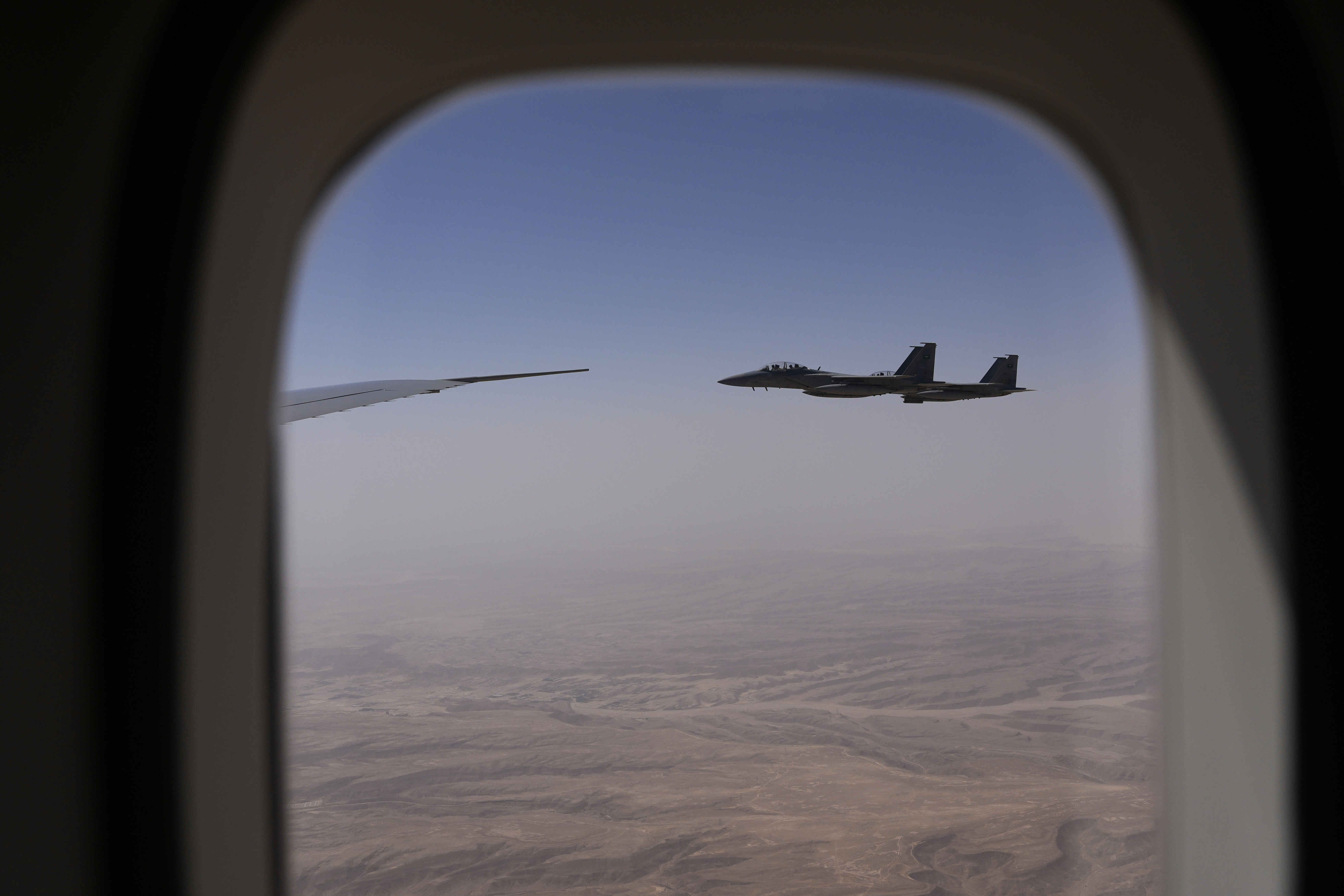 Royal Saudi Air Force F-15s provide an honorary escort for Air Force One, with President Donald Trump aboard, as it arrives in Saudi Arabia, Tuesday, May 13, 2025. (AP Photo/Alex Brandon)