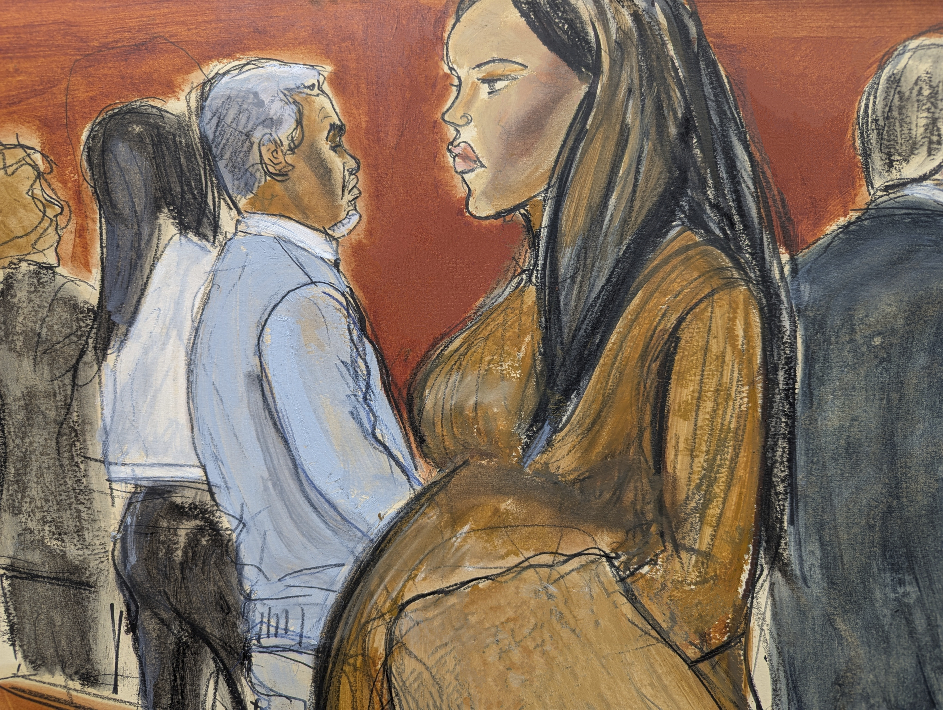 Cassie Ventura, right, walks out of the courtroom past Sean Diddy Combs after testifying in Manhattan federal court, Tuesday, May 13, 2025, in New York. (Elizabeth Williams via AP)