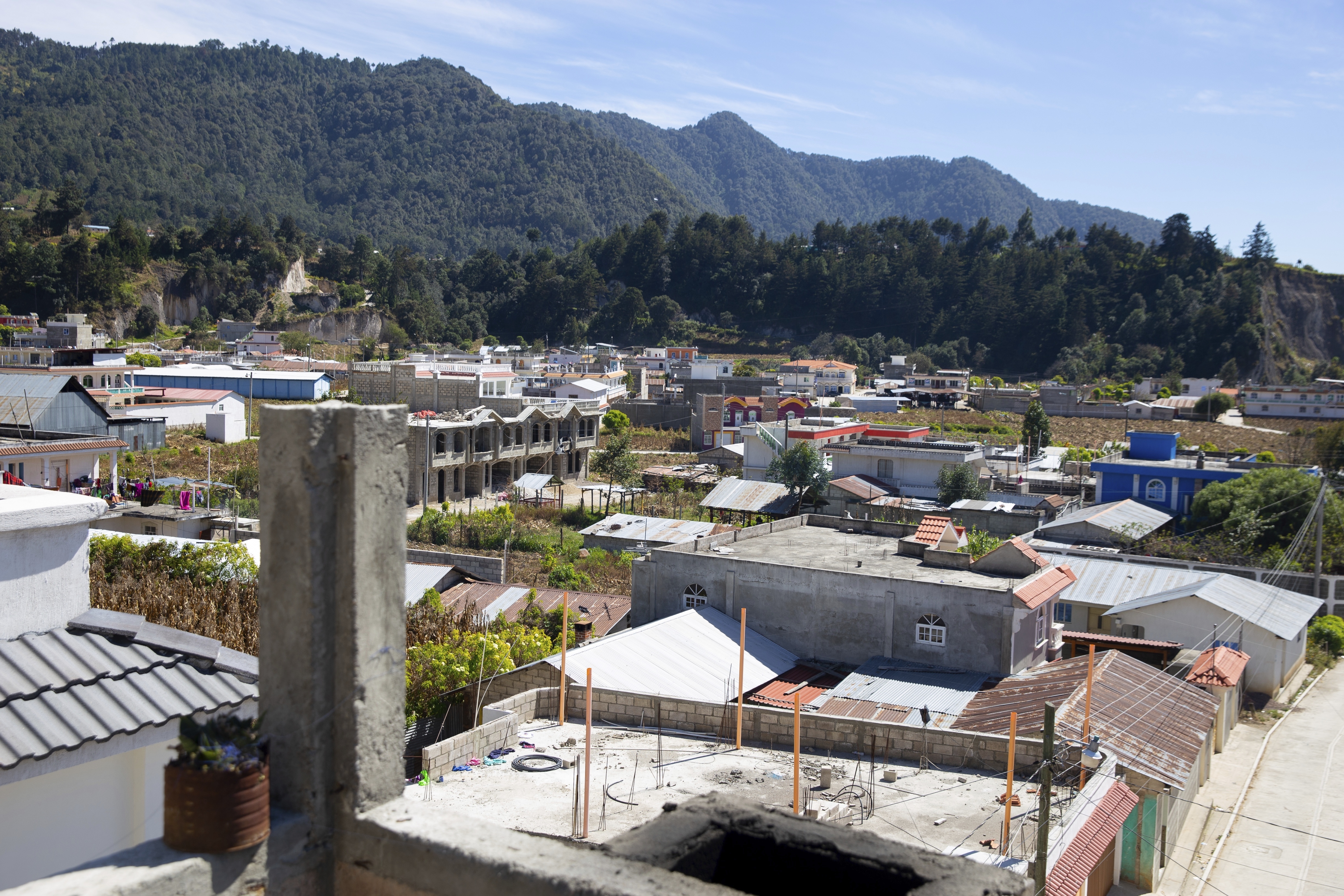 Money sent home to Cajola, Guatemala, from the U.S. paid for the construction of dozens of homes, as shown, Nov. 29, 2021. (AP Photo/Megan Janetsky)