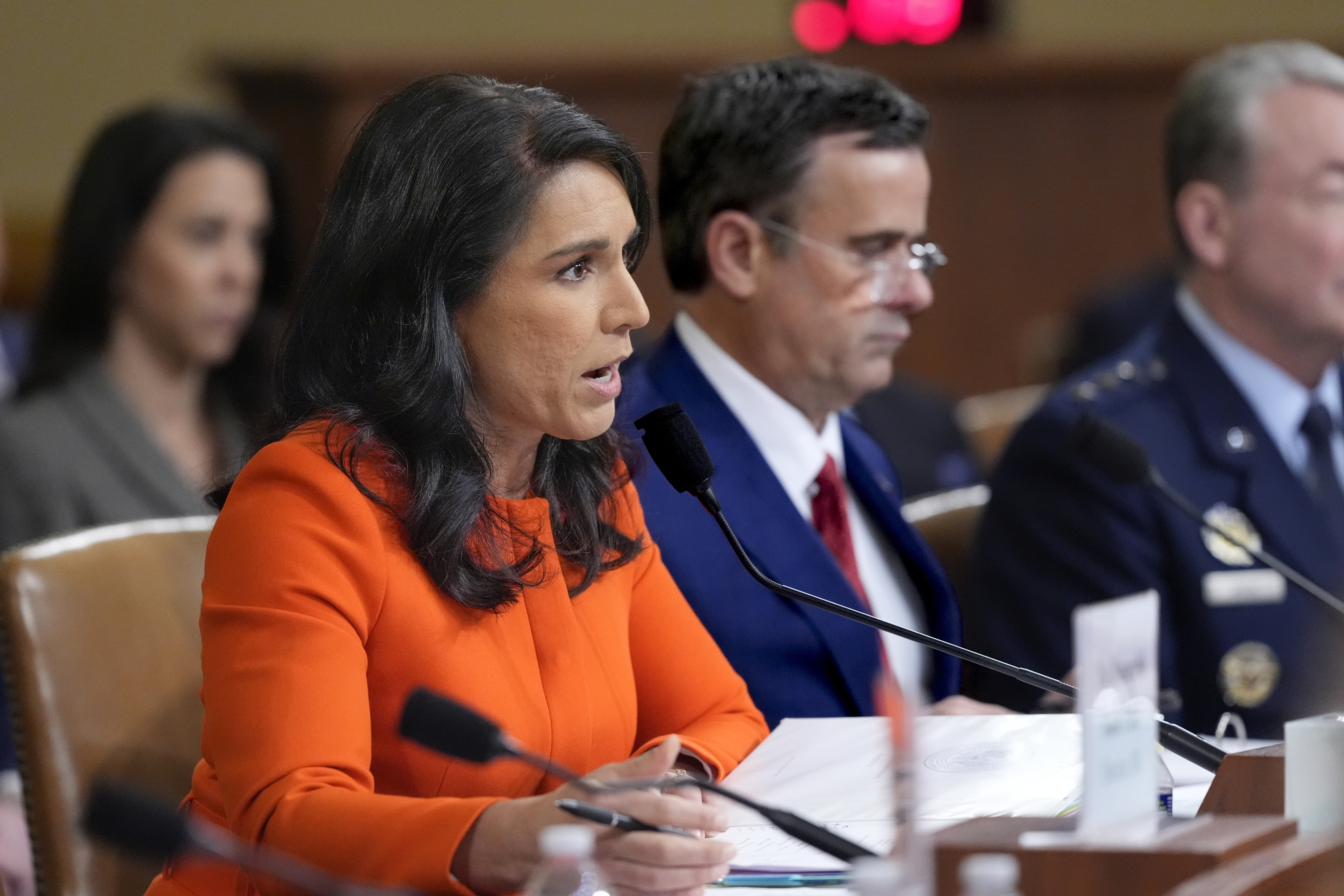 FILE - Director of National Intelligence Tulsi Gabbard, left, joined by CIA Director John Ratcliffe, testifies as the House Intelligence Committee holds a hearing on worldwide threats, at the Capitol, in Washington, March 26, 2025. (AP Photo/J. Scott Applewhite, File)