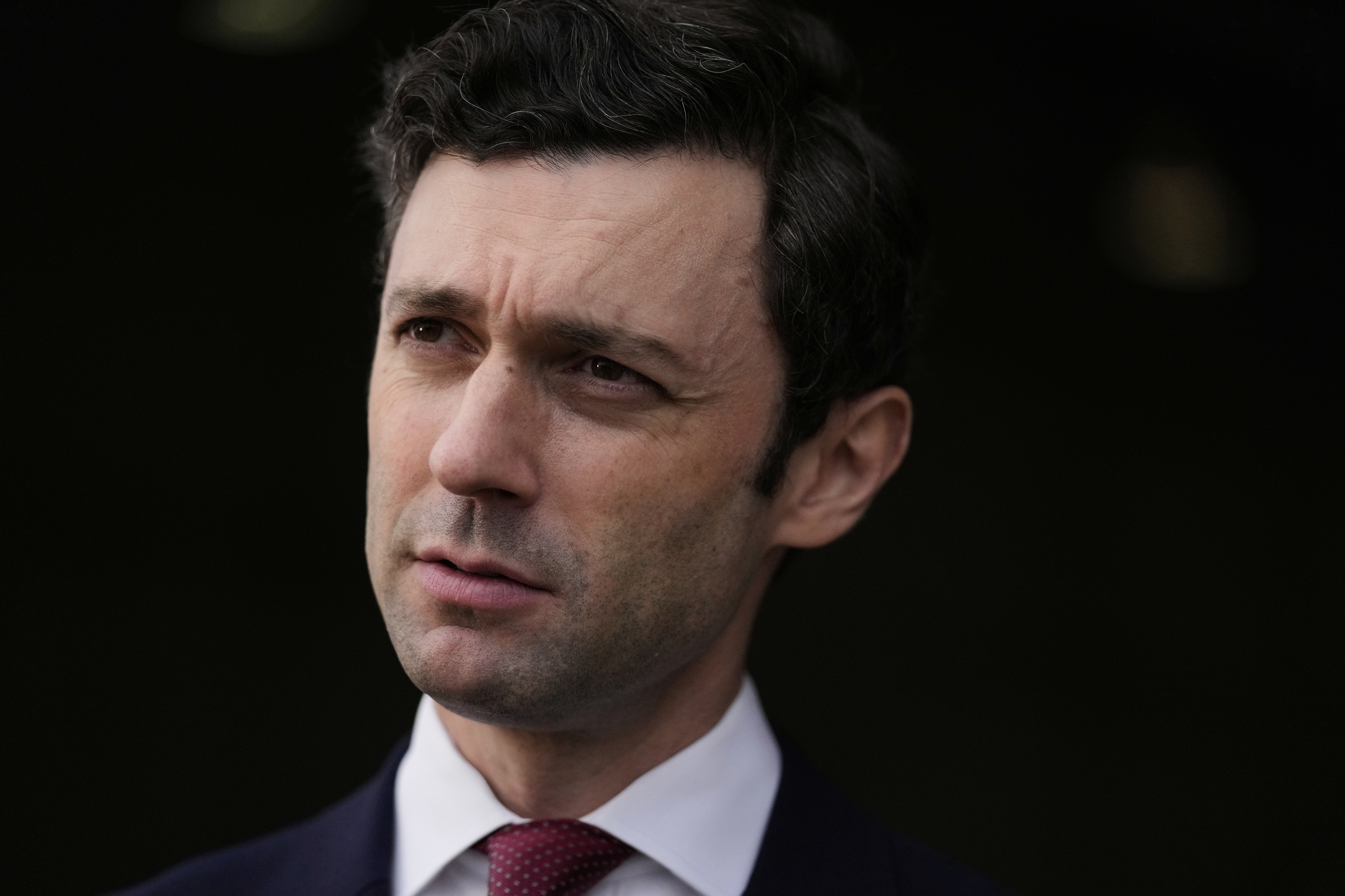 Sen. Jon Ossoff, D-Ga., speaks during an interview at Dobbins Air Reserve Base, Saturday, April 26, 2025, in Marietta, Ga. (AP Photo/Brynn Anderson)