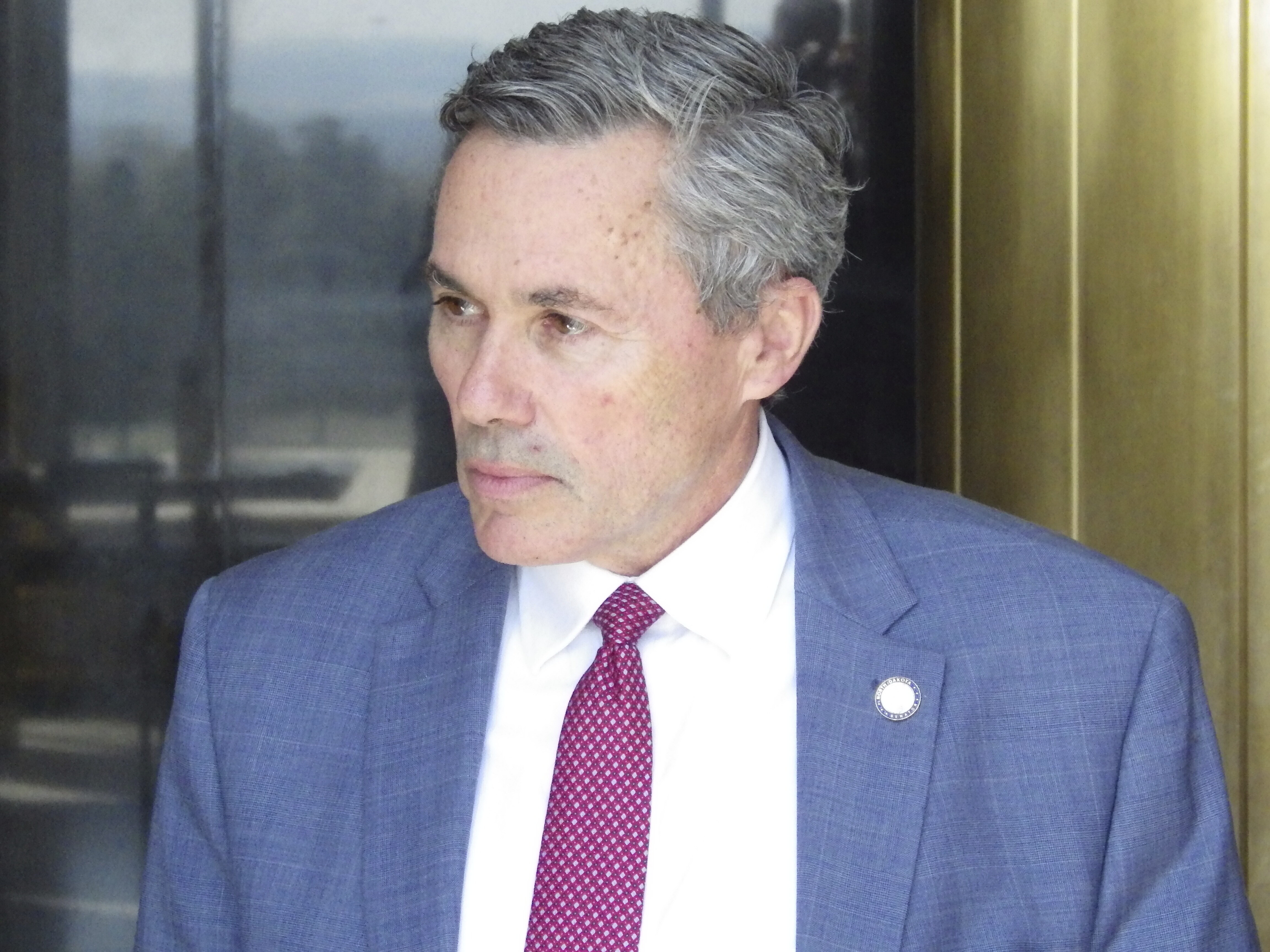 North Dakota Republican Senate Majority Leader David Hogue, of Minot, is seen Friday, May 2, 2025, before a bill signing in Memorial Hall of the state Capitol in Bismarck, N.D. (AP Photo/Jack Dura)