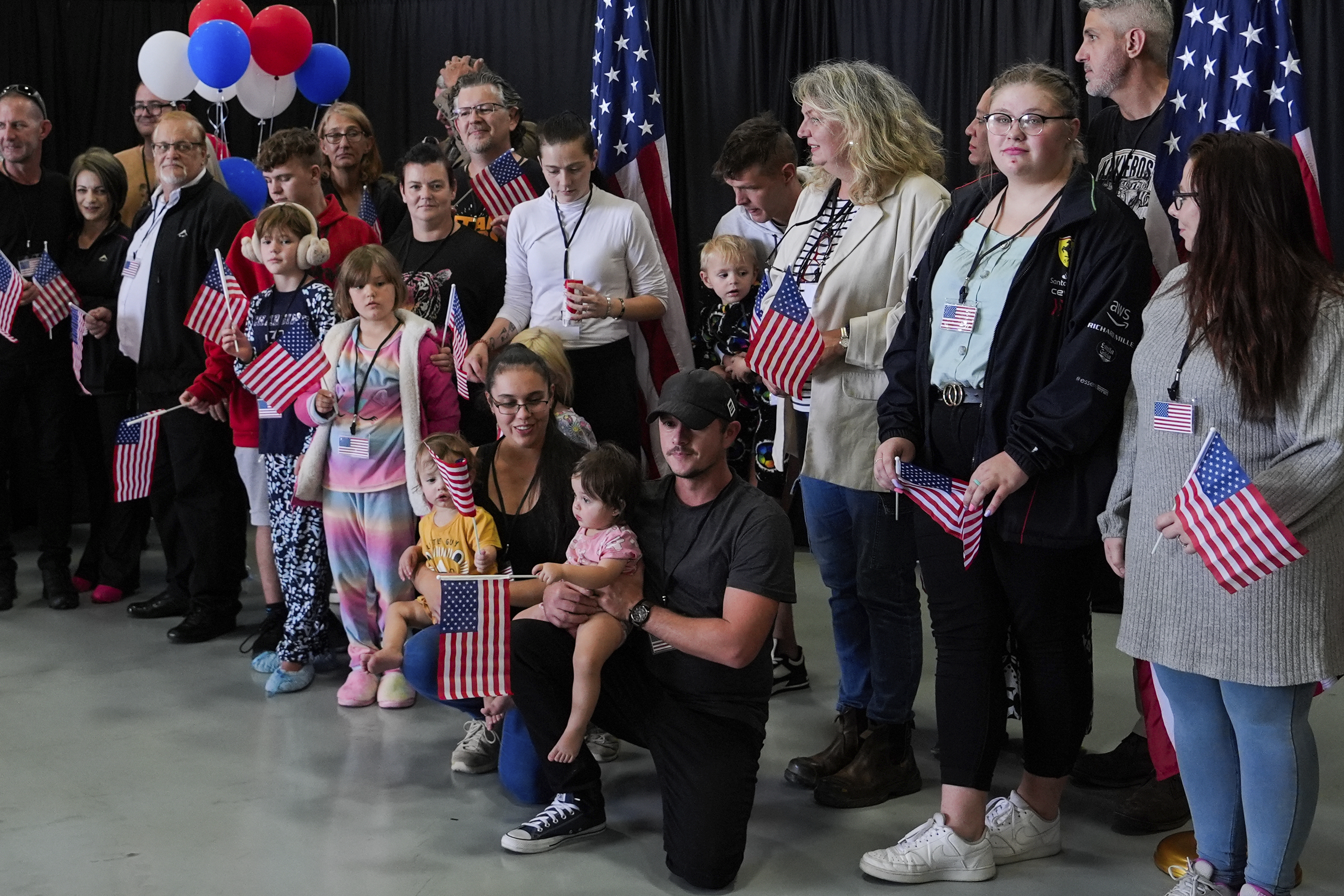 Afrikaner refugees from South Africa arrive, Monday, May 12, 2025, at Dulles International Airport in Dulles, Va. (AP Photo/Julia Demaree Nikhinson)