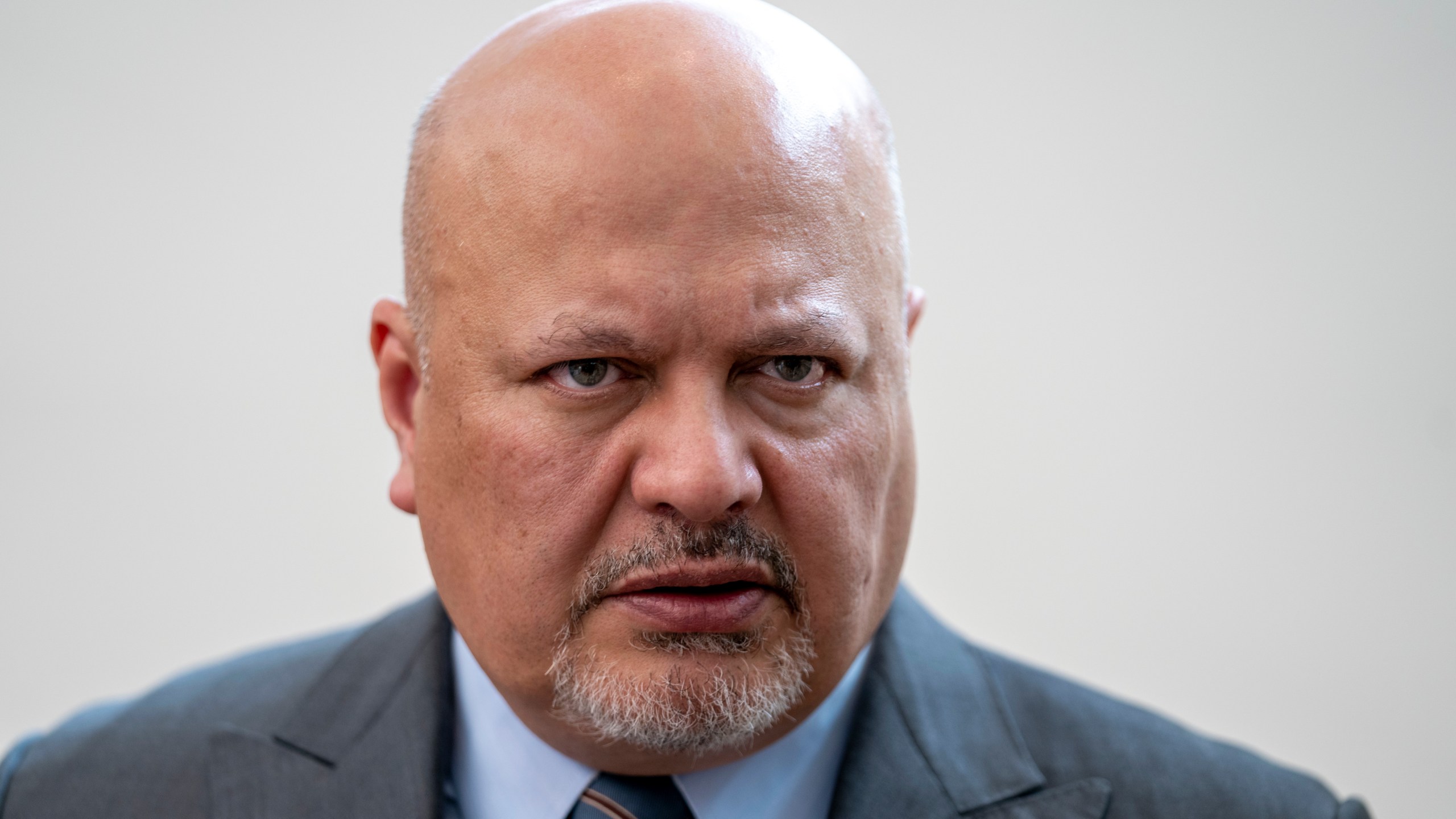 FILE - Karim Khan, Prosecutor of the International Criminal Court looks up prior to a press conference in The Hague, Netherlands, July 3, 2023. (AP Photo/Peter Dejong, File)