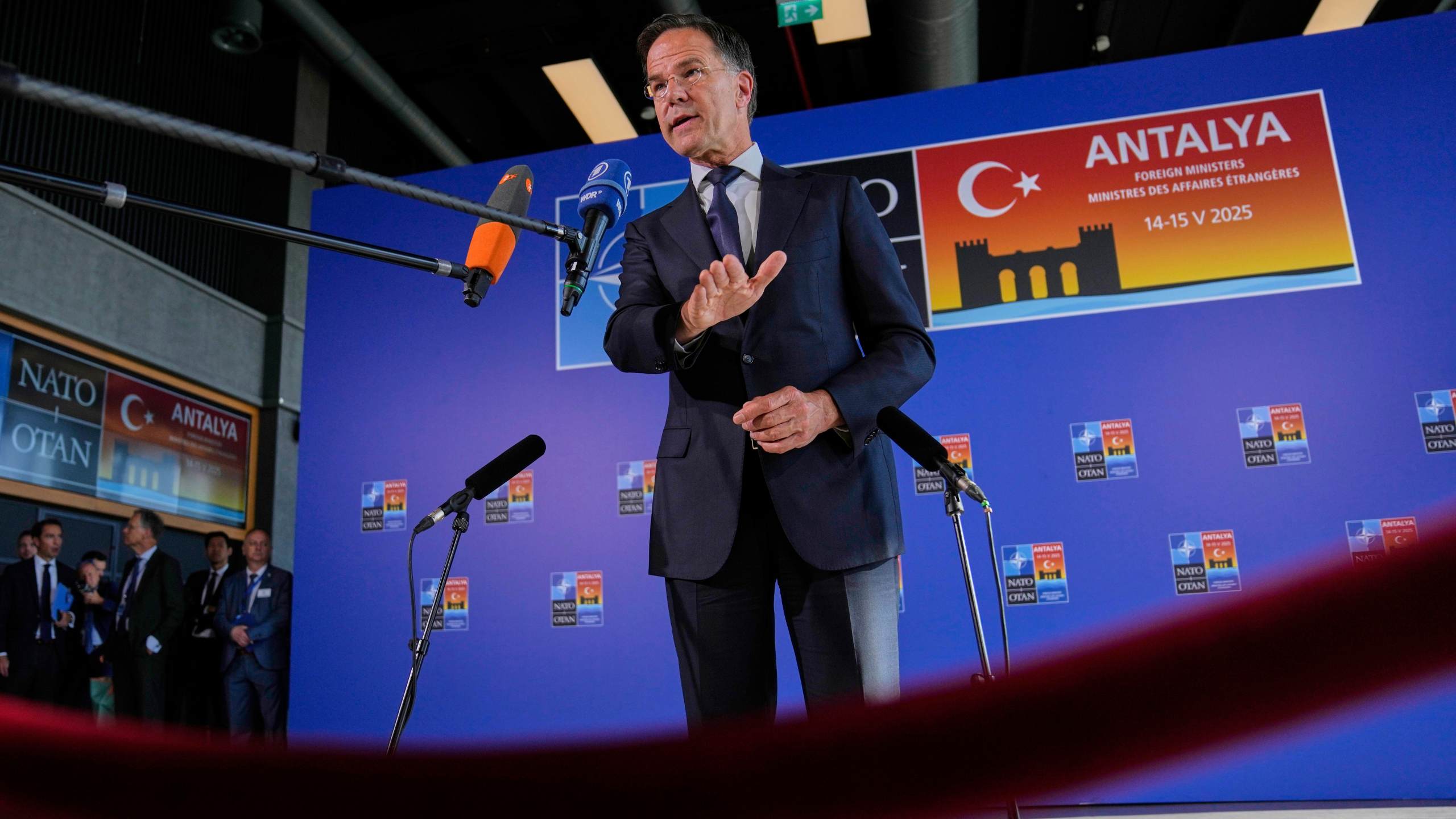 NATO Secretary General Mark Rutte talks to journalists as he arrives for NATO's informal meeting of foreign ministers in Antalya, southern Turkey, Thursday, May 15, 2025. (AP Photo/Khalil Hamra)