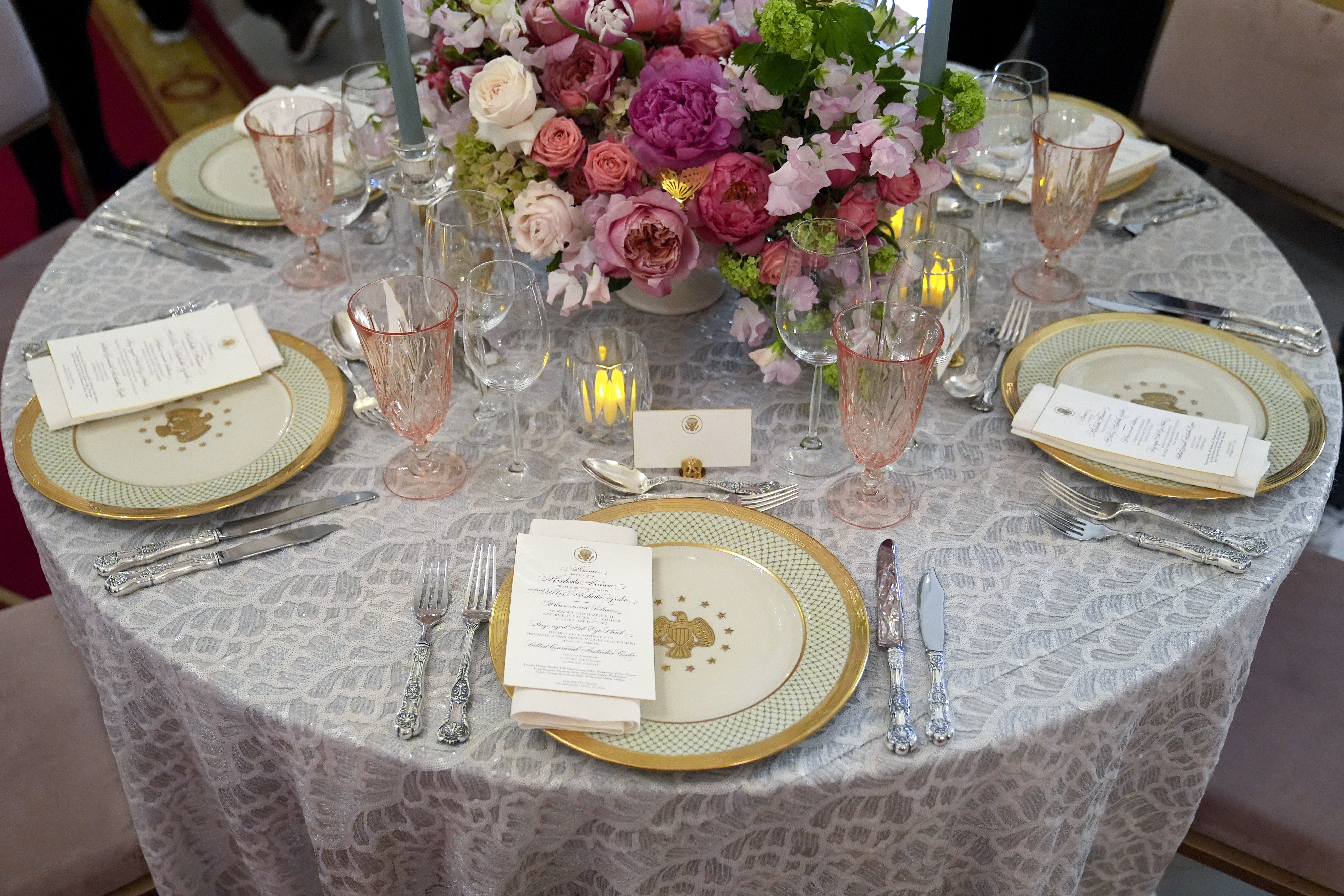 FILE - Tables are decorated during a press preview at the White House in Washington, April 9, 2024, for the State Dinner for Japan's Prime Minister Fumio Kishida. (AP Photo/Susan Walsh, File)