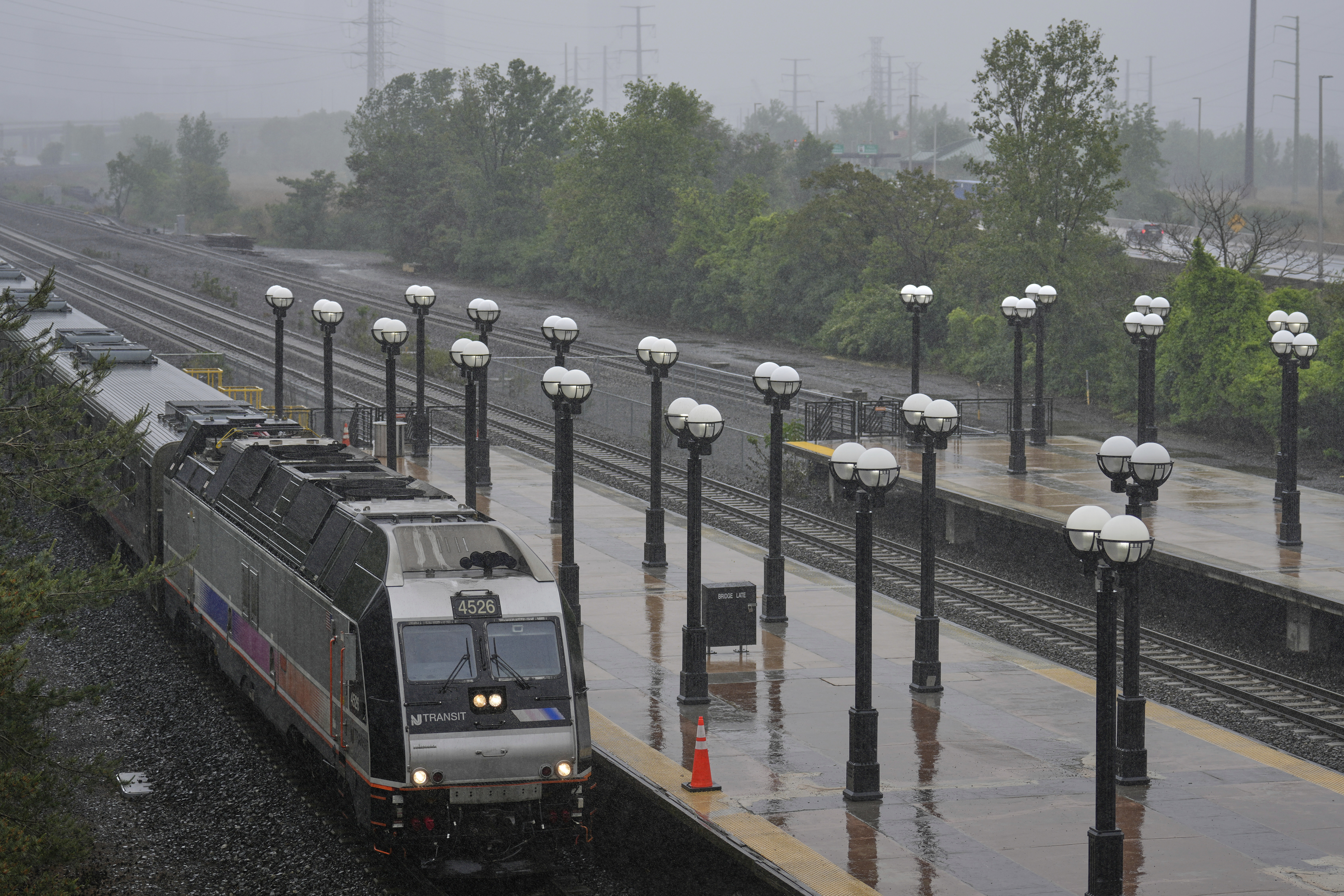An NJ Transit train pulls into the Secaucus Junction station in Secaucus, N.J., Wednesday, May 14, 2025. (AP Photo/Seth Wenig)