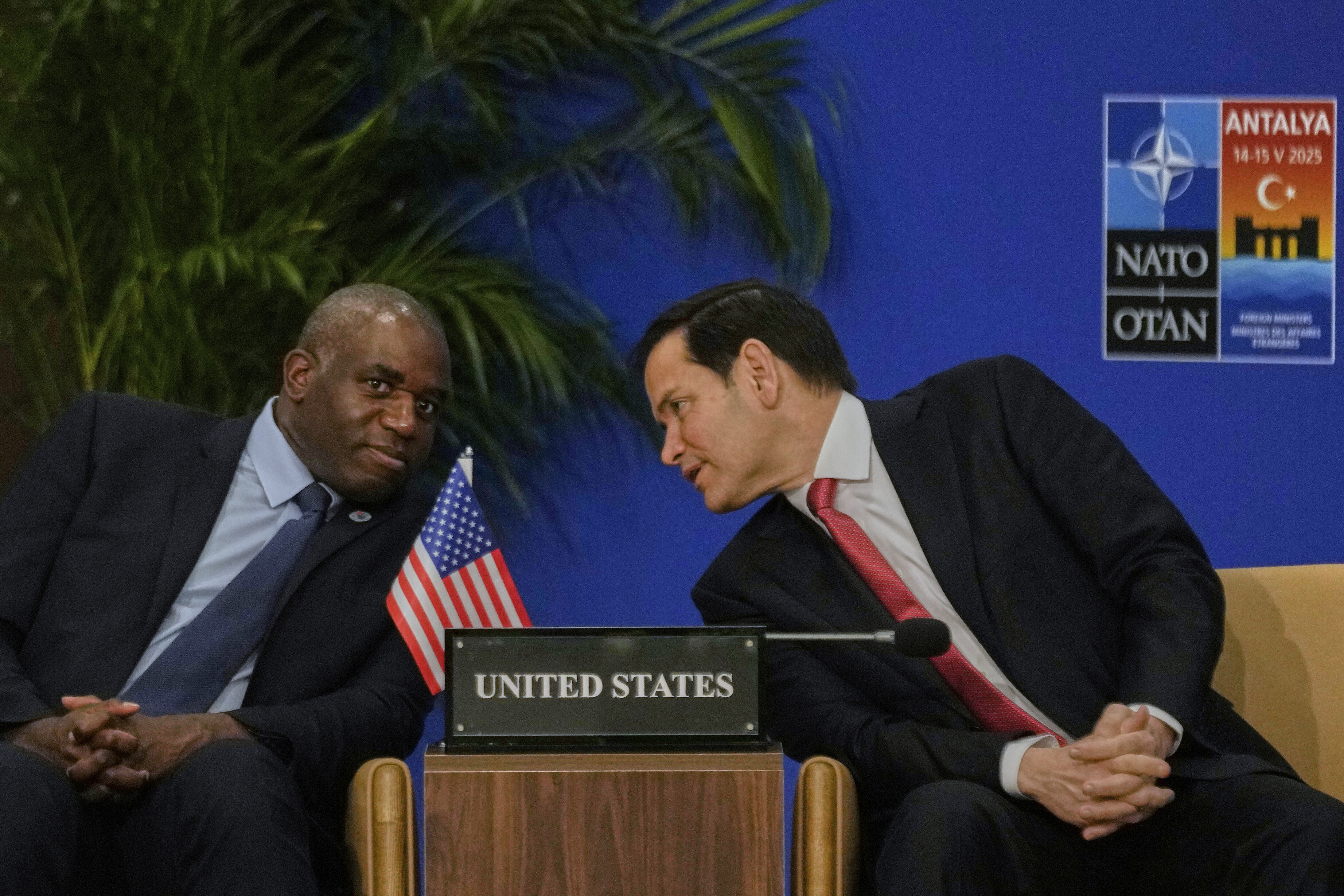 United States Secretary of State Marco Rubio, right, talks to British Foreign Secretary David Lammy during an informal meeting of NATO's foreign ministers in Antalya, southern Turkey, Thursday, May 15, 2025. (AP Photo/Khalil Hamra)