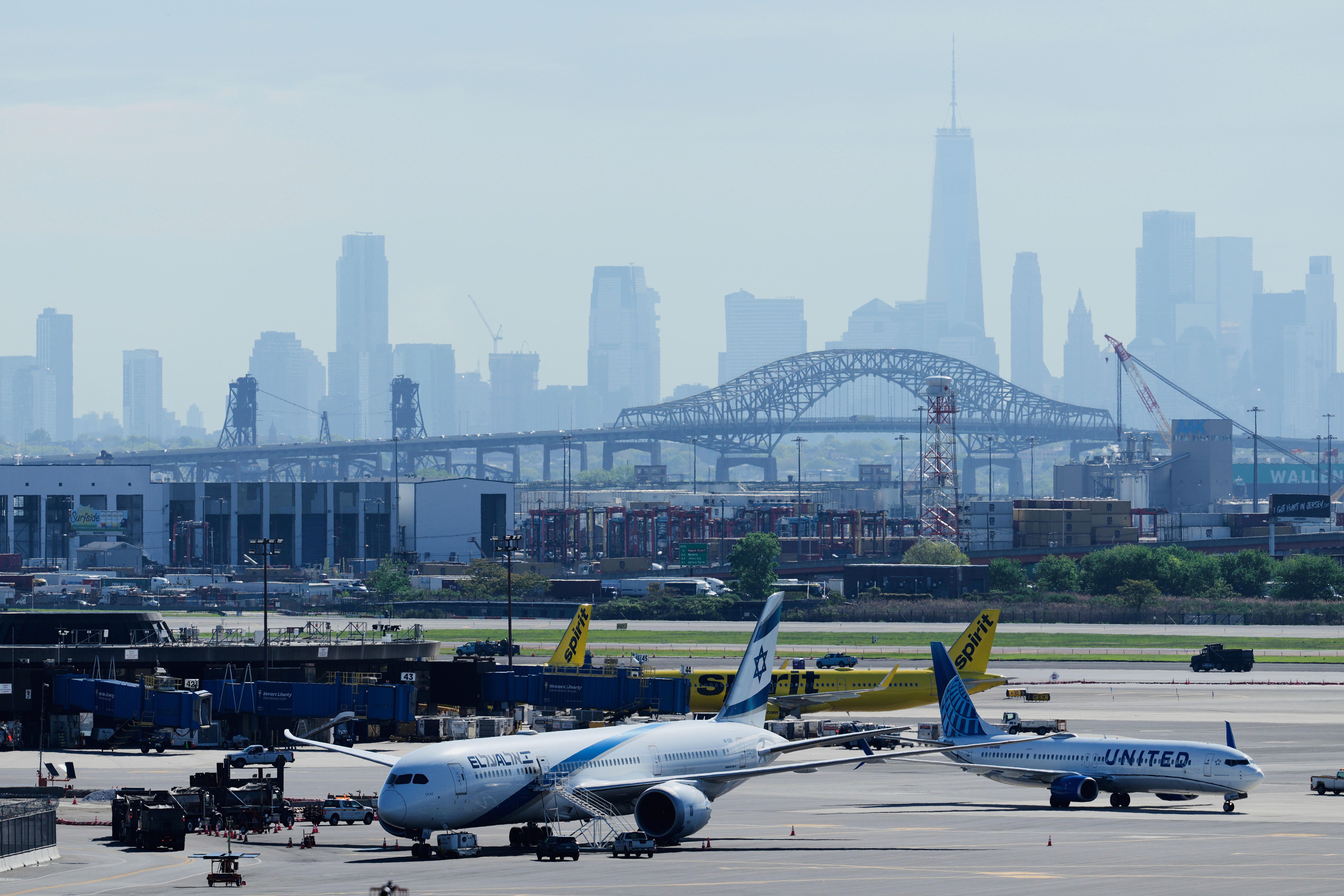 The New York City skyline is seen behind Newark Liberty International Airport in Newark, N.J., Wednesday, May 7, 2025. (AP Photo/Seth Wenig)