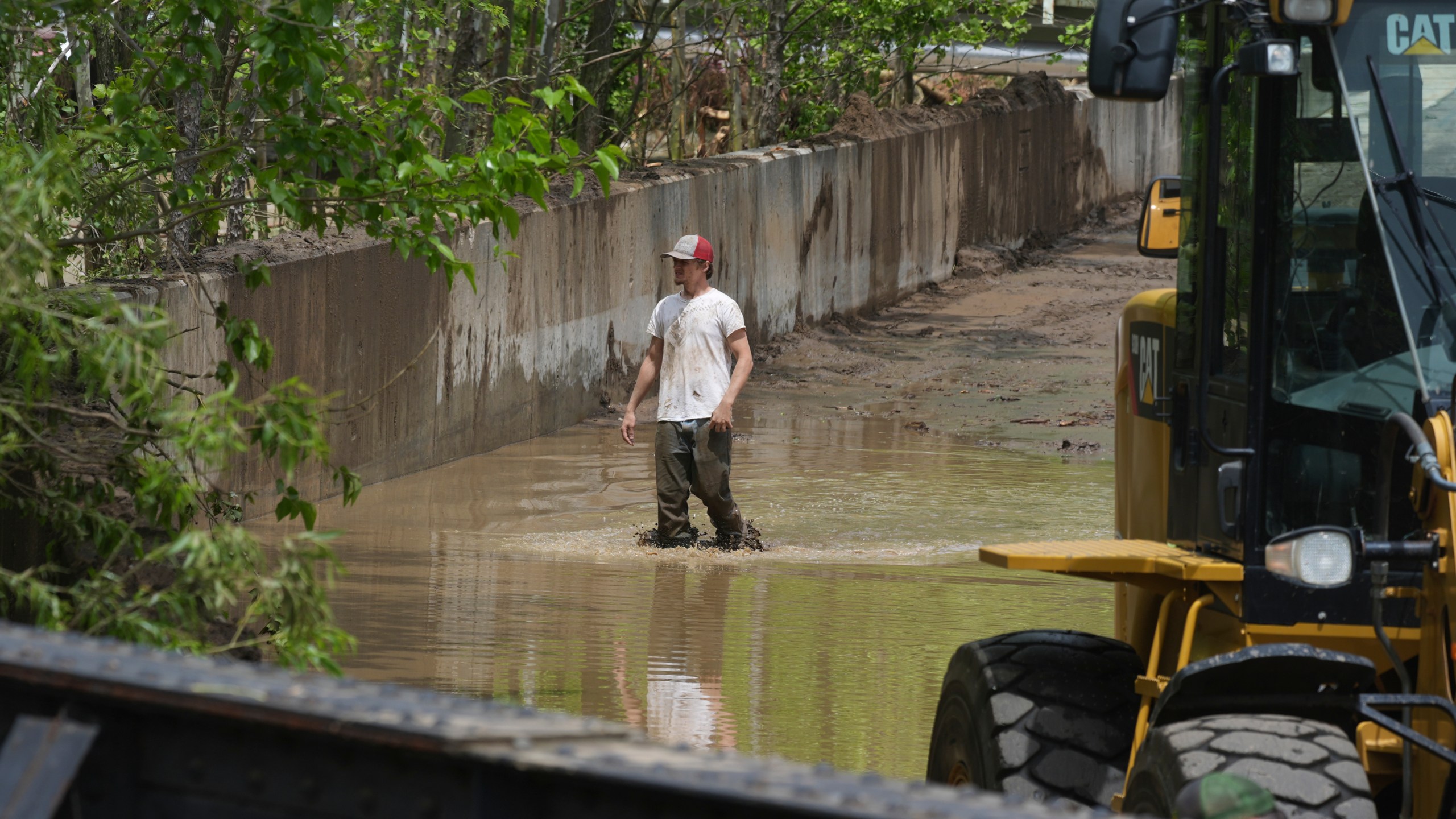 Clean up continues inside the fire station after flooding on Wednesday, May 14, 2025 in Westernport, Md. (AP Photo/Gene J. Puskar)