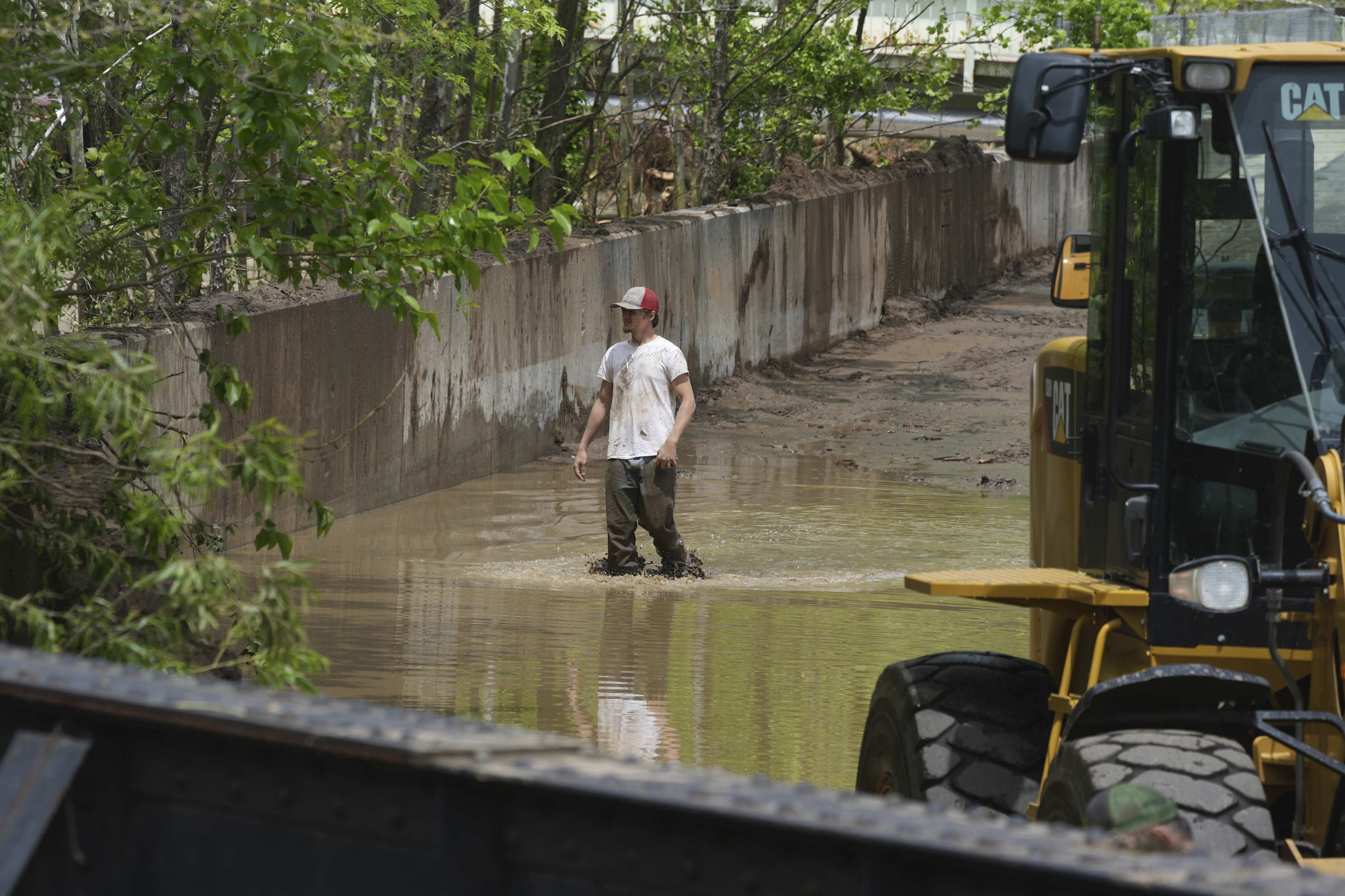 Clean up continues inside the fire station after flooding on Wednesday, May 14, 2025 in Westernport, Md. (AP Photo/Gene J. Puskar)