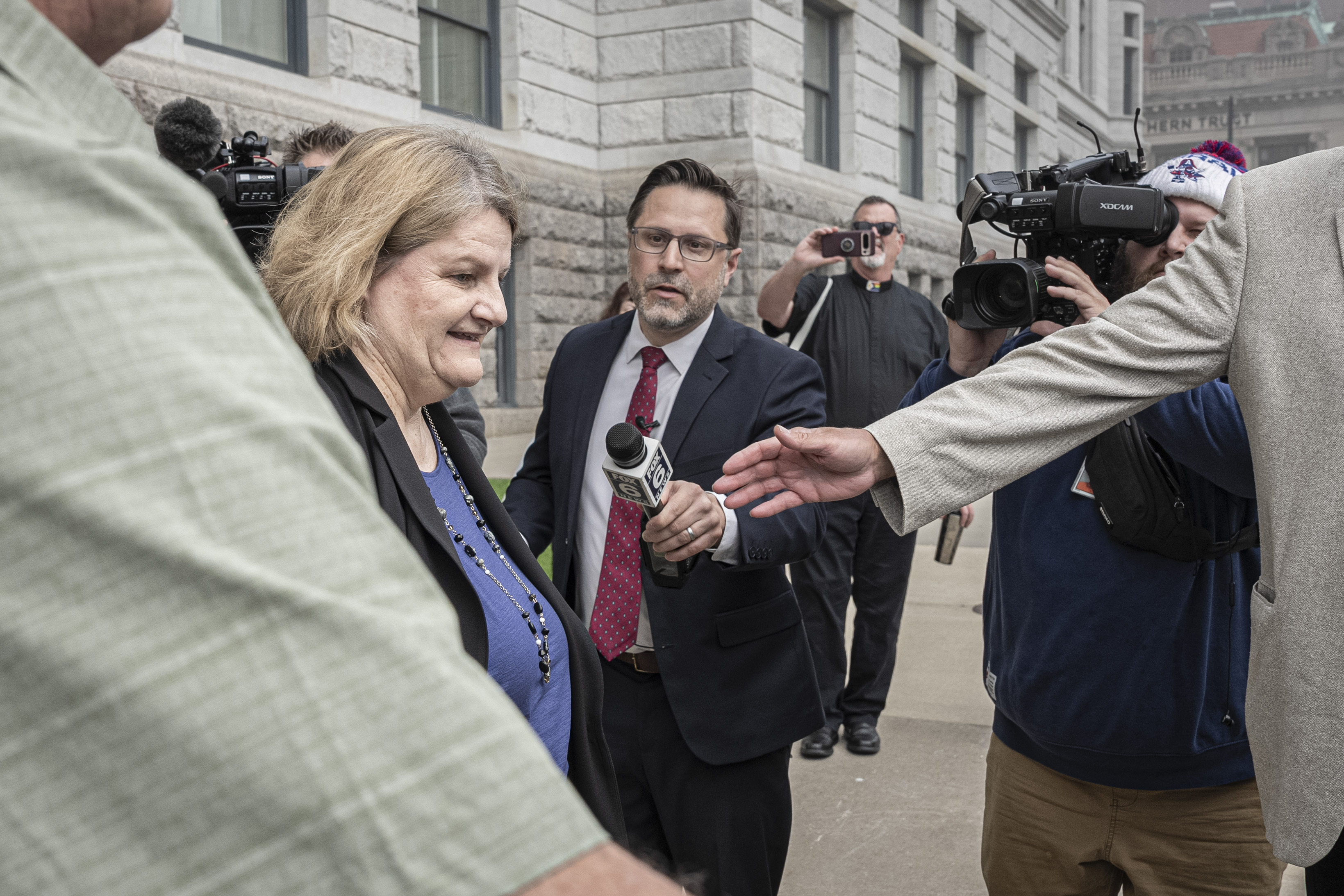 FILE - Milwaukee County Circuit Judge Hannah Dugan leaves the federal courthouse after a hearing Thursday, May 15, 2025, in Milwaukee. (AP Photo/Andy Manis, file)