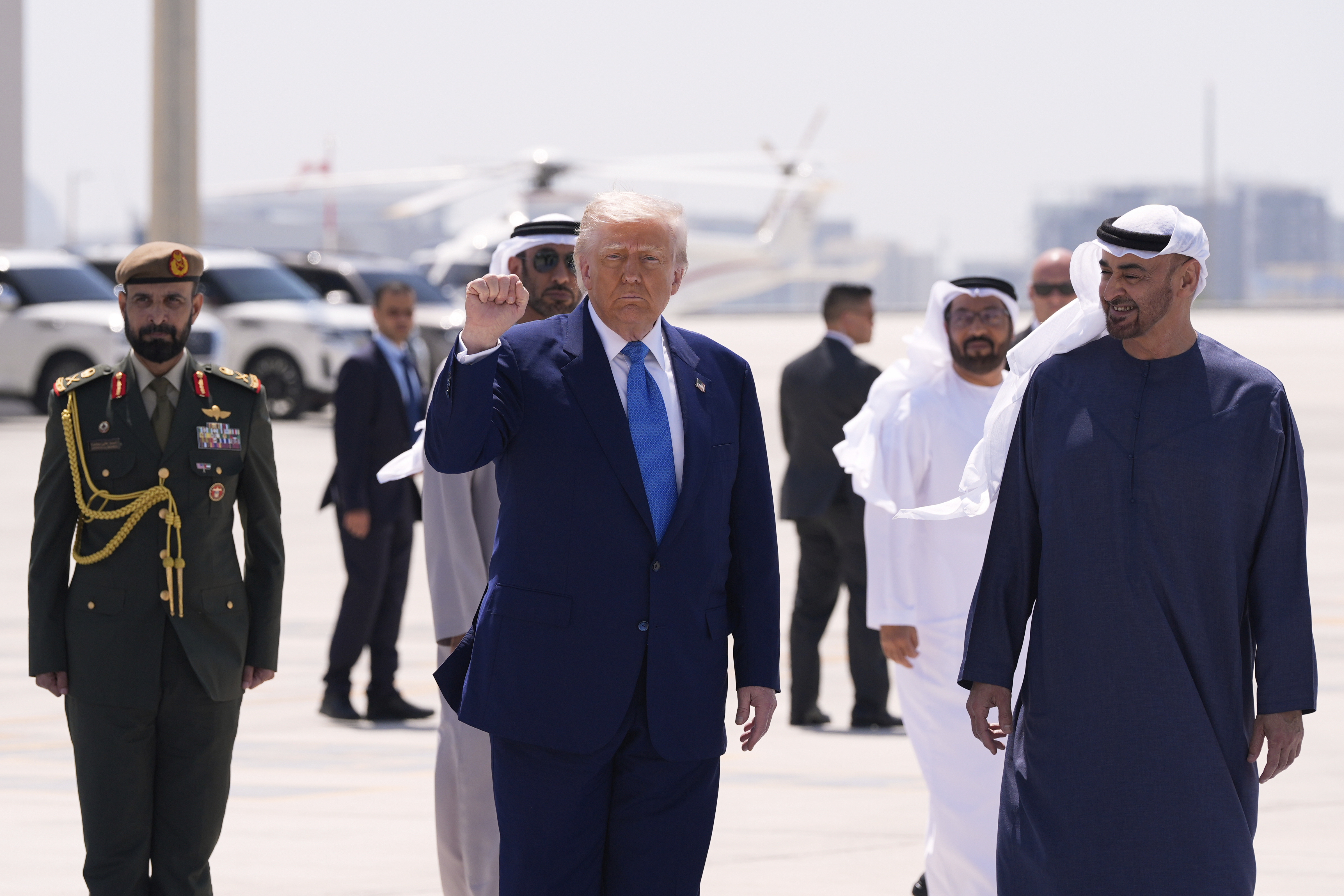 President Donald Trump gestures before departing on Air Force One at Abu Dhabi International Airport, Friday, May 16, 2025, in Abu Dhabi, United Arab Emirates. (AP Photo/Alex Brandon)