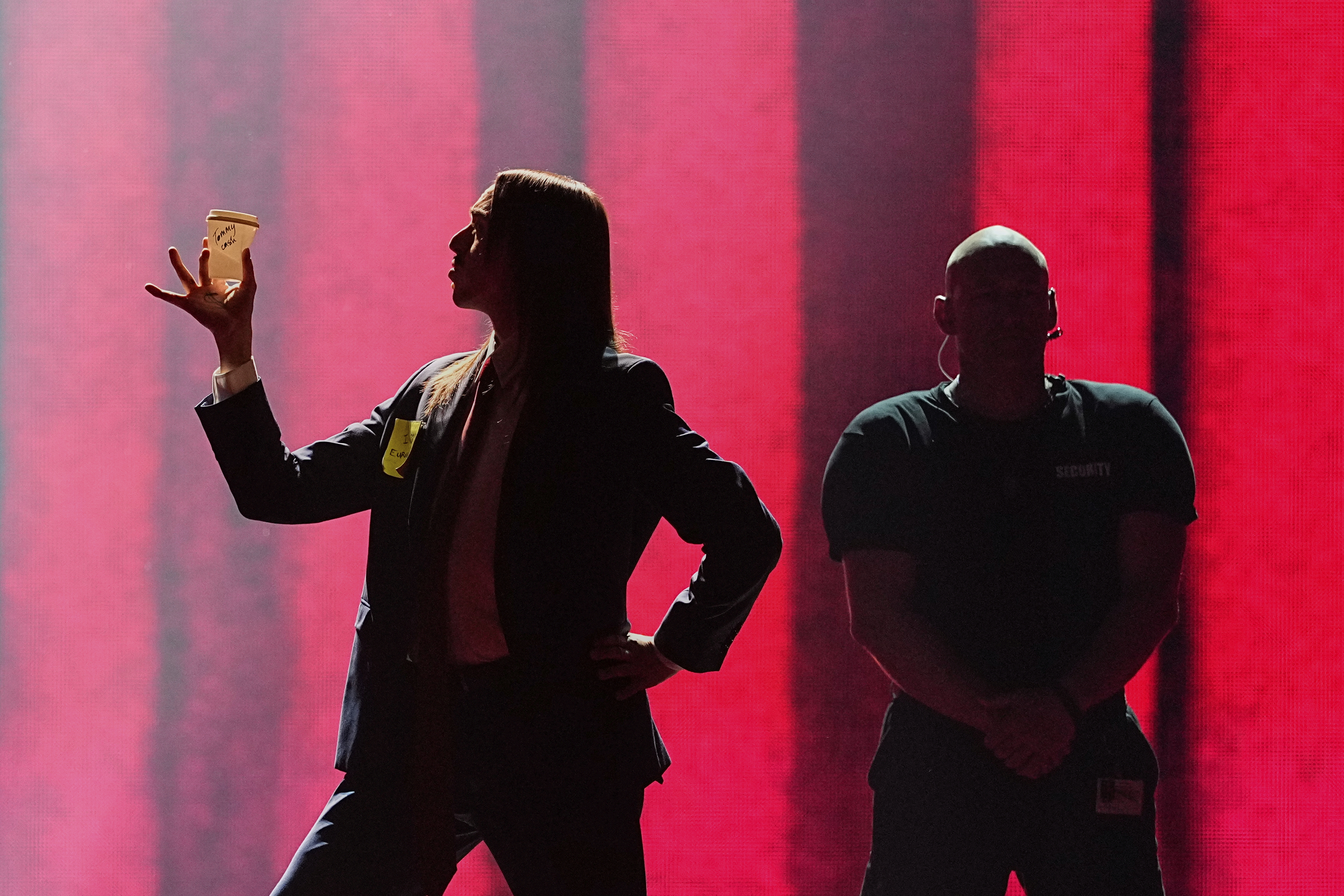 Tommy Cash from Estonia performs the song "Espresso Macchiato" during the first semi-final of the 69th Eurovision Song Contest, in Basel, Switzerland, Tuesday, May 13, 2025. (AP Photo/Martin Meissner)