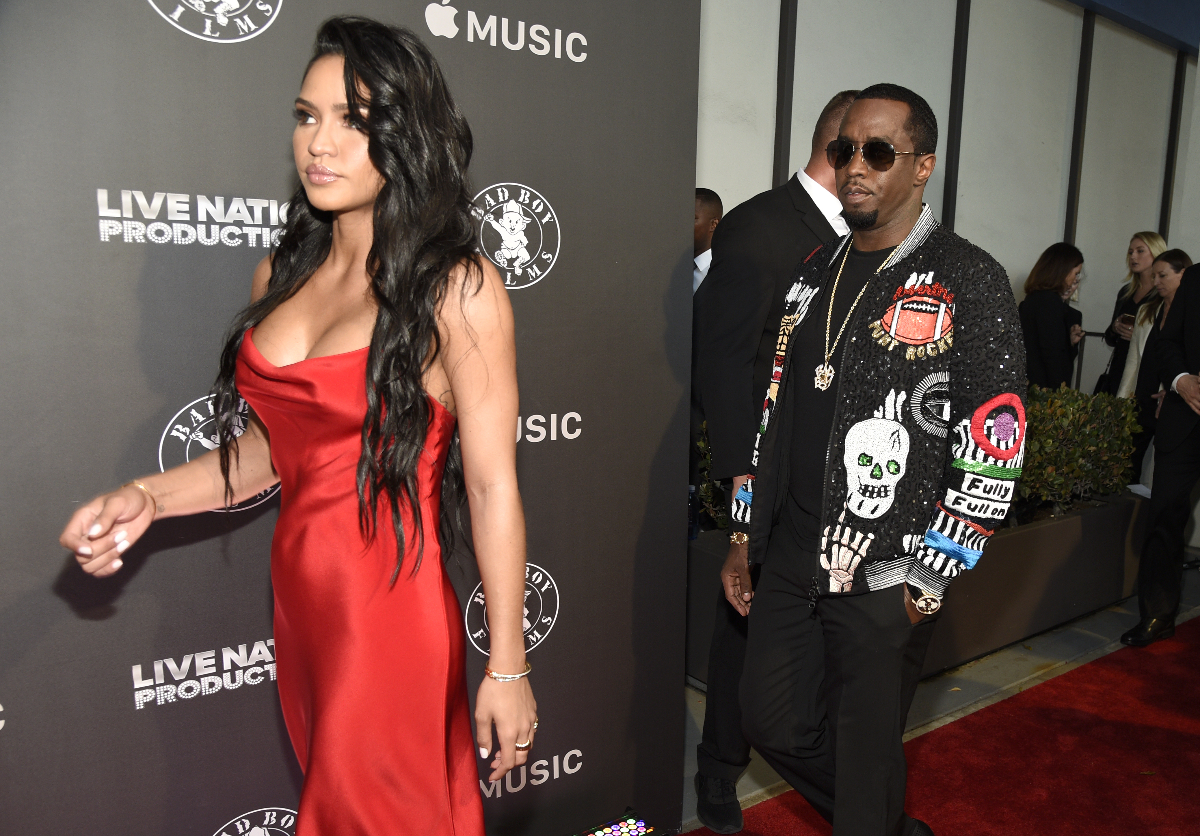 FILE - Cassie Ventura, left, and Sean "Diddy" Combs, arrive at the Los Angeles premiere of "Can't Stop, Won't Stop: A Bad Boy Story" at the Writers Guild Theater, June 21, 2017, in Beverly Hills, Calif. (Photo by Chris Pizzello/Invision/AP File)