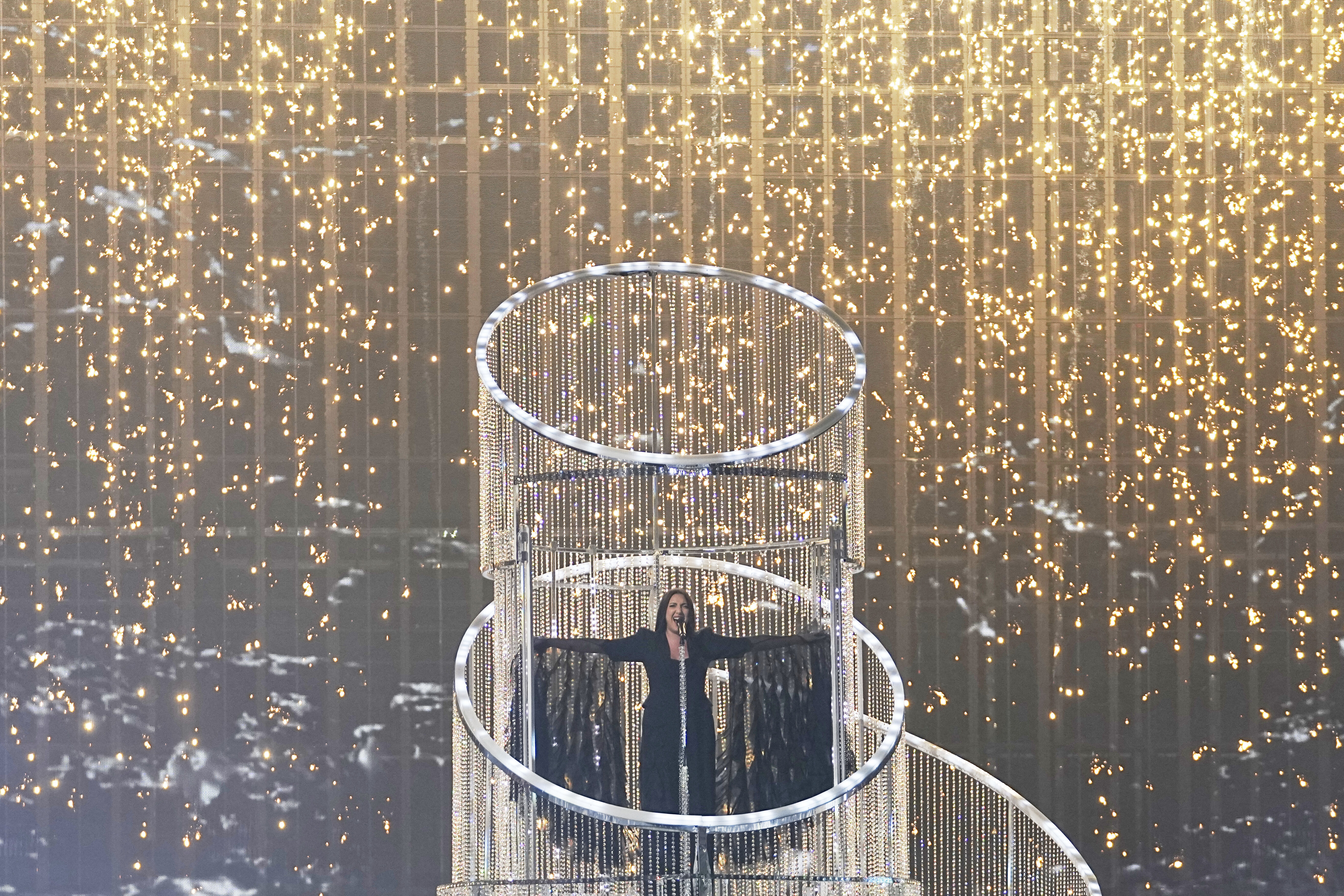 Yuval Raphael from Israel performs the song "New Day Will Rise" during the dress rehearsal for the Grand Final of the 69th Eurovision Song Contest, in Basel, Switzerland, Friday, May 16 2025. (AP Photo/Martin Meissner)