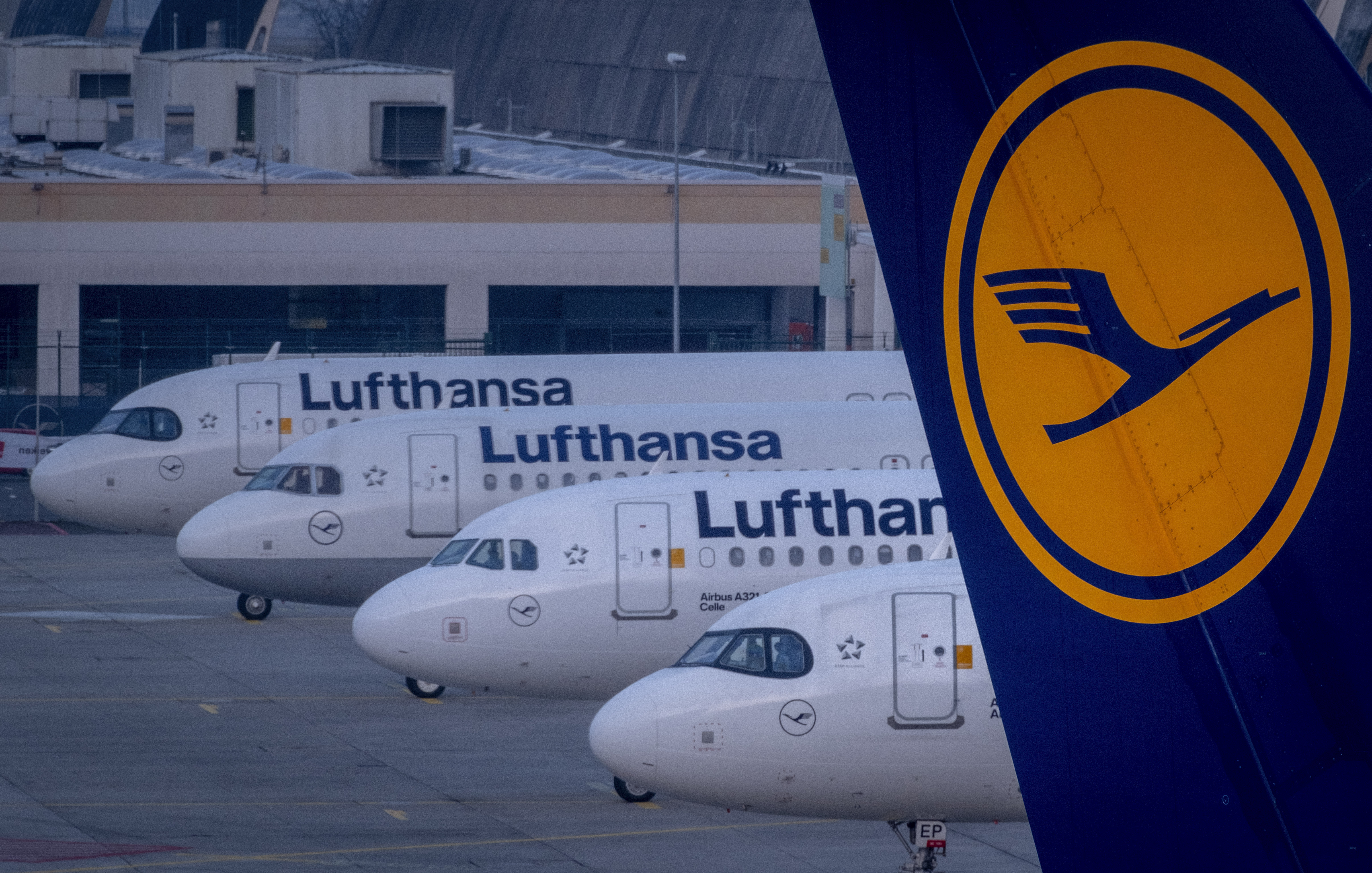 FILE - Lufthansa aircrafts are parked at the airport in Frankfurt, Germany, Thursday, March 7, 2024. (AP Photo/Michael Probst, File)