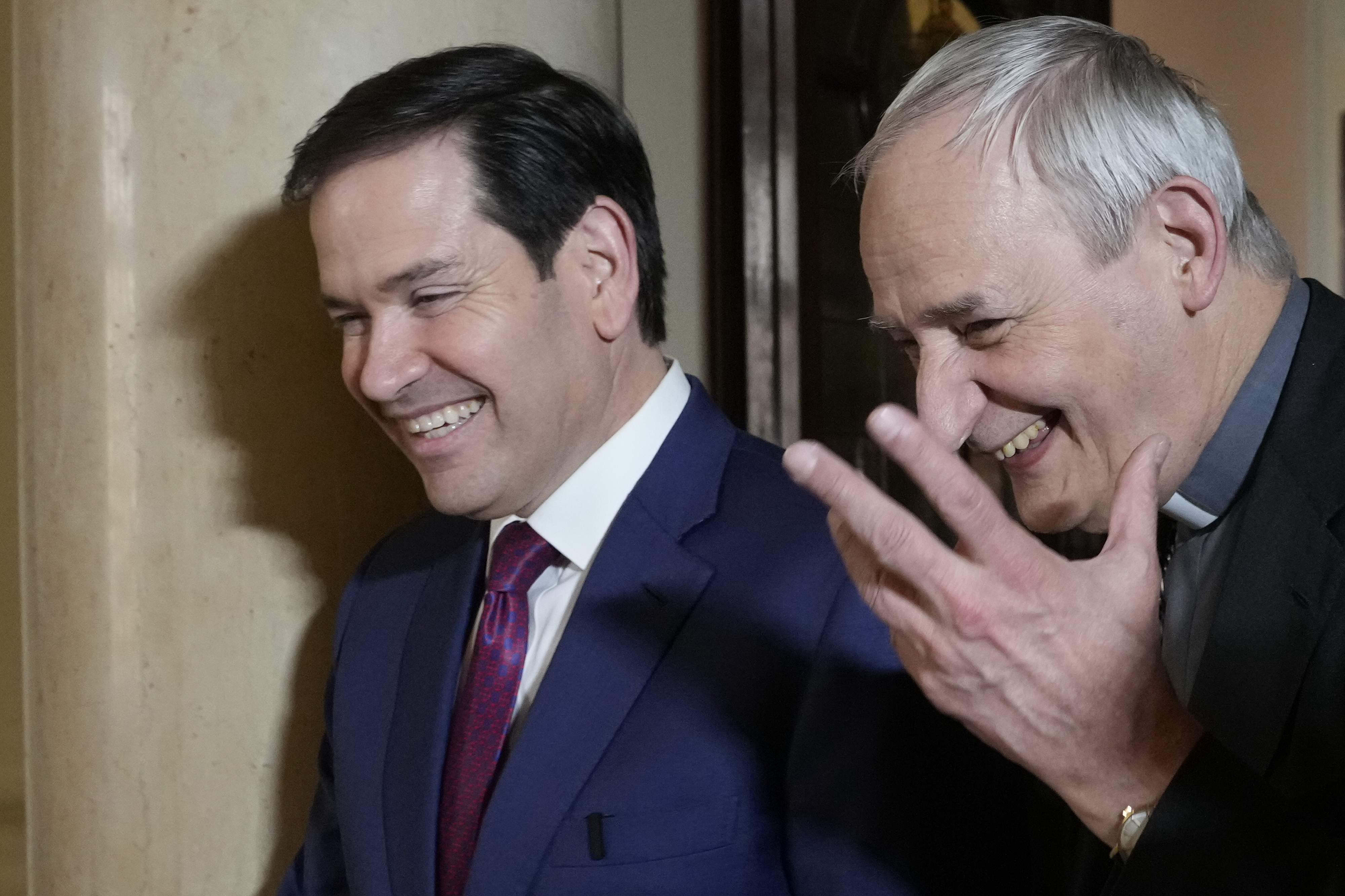 Secretary of State Marco Rubio, left, and President of the Conference of Italian Bishops, Cardinal Matteo Zuppi, meet at the U.S. Embassy to the Holy See in Rome, Saturday, May 17, 2025. (AP Photo/Gregorio Borgia)