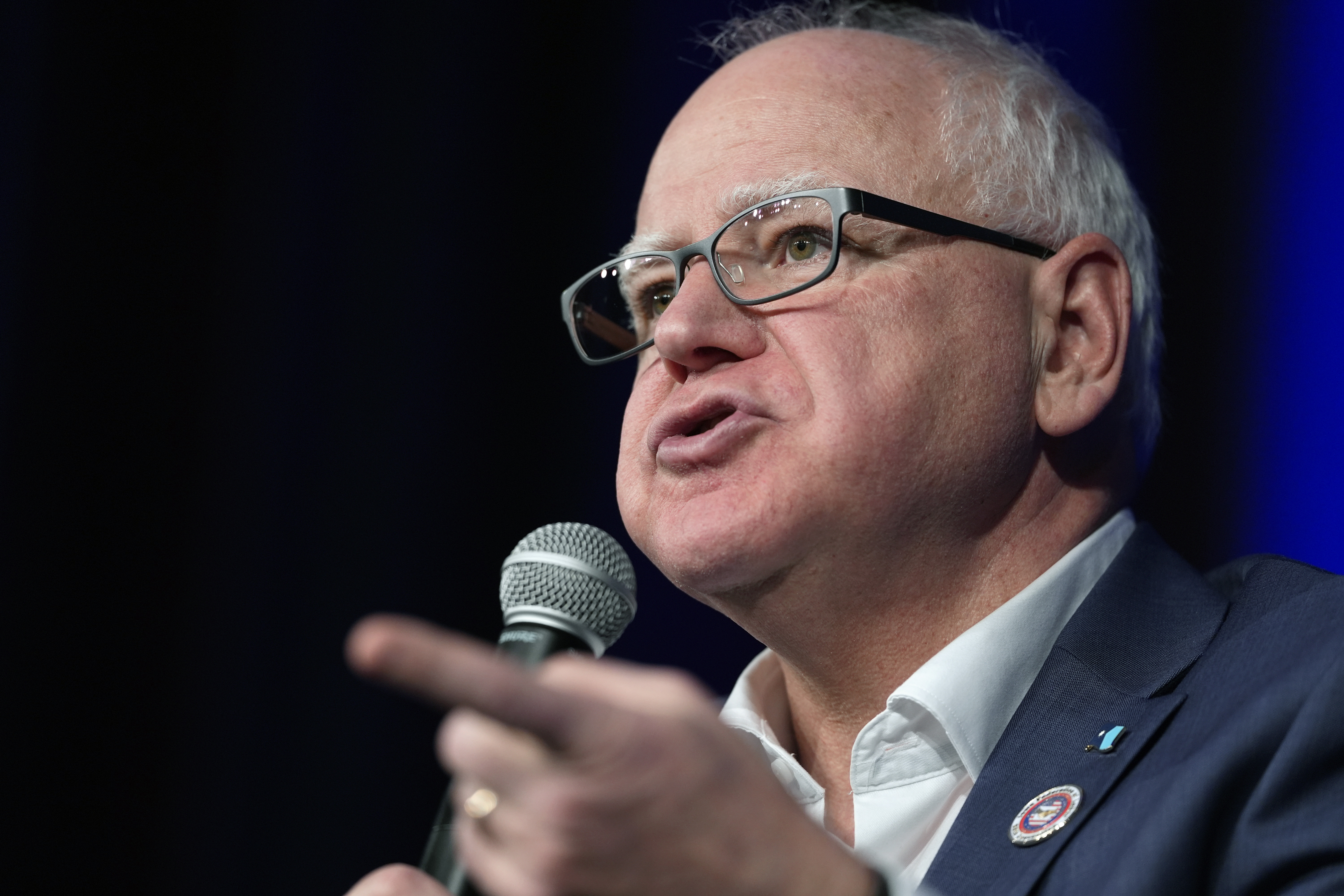 FILE - Minnesota Gov. Tim Walz speaks at a town hall event at Roosevelt High School, Friday, March 14, 2025, in Des Moines, Iowa. (AP Photo/Matthew Putney,File)