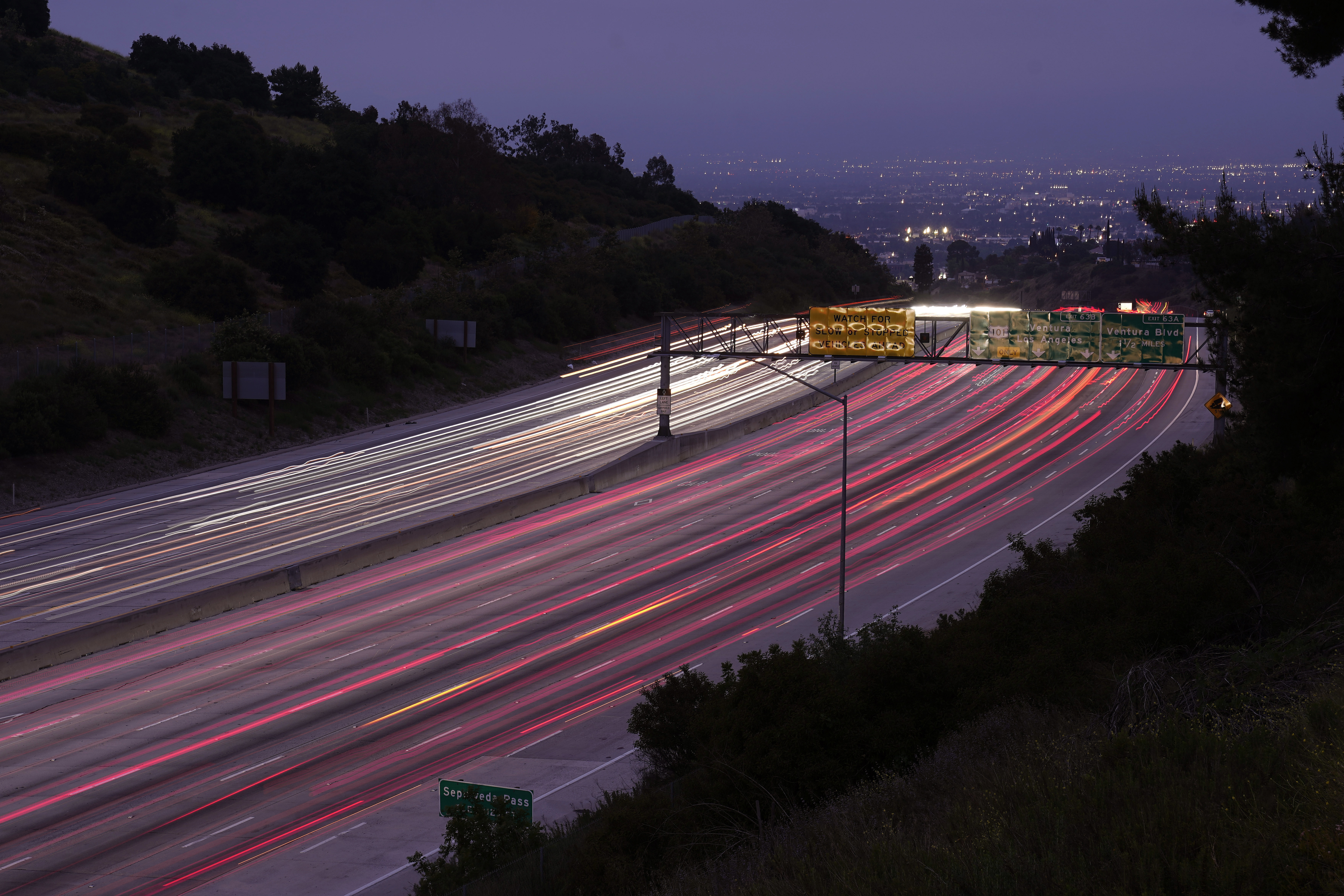 FILE - Traffic slowly moves along Interstate 405 Thursday, May 23, 2024, in the Bel Air section of Los Angeles ahead of Memorial Day. (AP Photo/Mark J. Terrill, File)