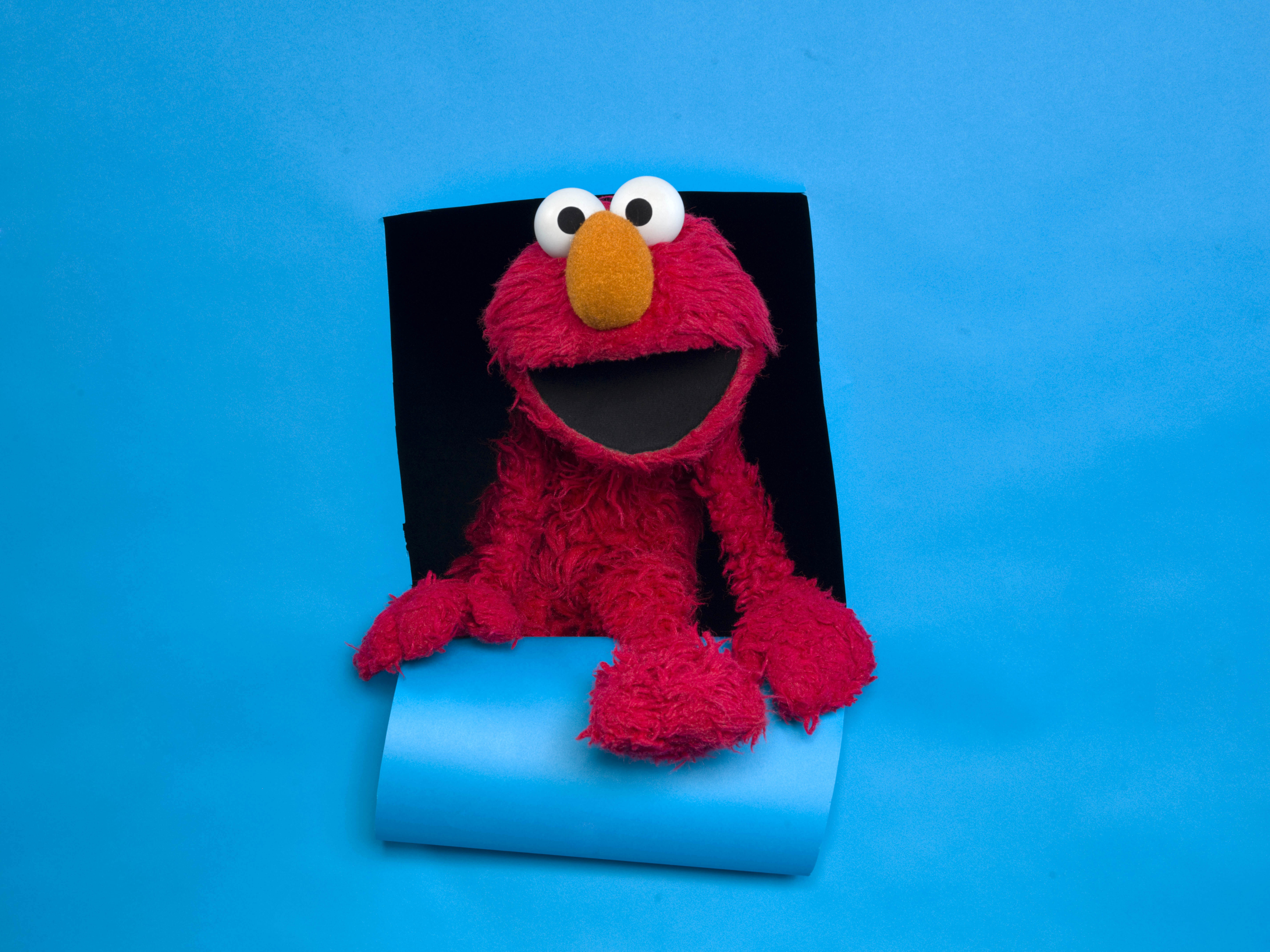 FILE - Elmo of the film "Being Elmo" poses for a portrait in the Fender Music Lodge during the 2011 Sundance Film Festival in Park City, Utahm Jan. 24, 2011. (AP Photo/Victoria Will, File)