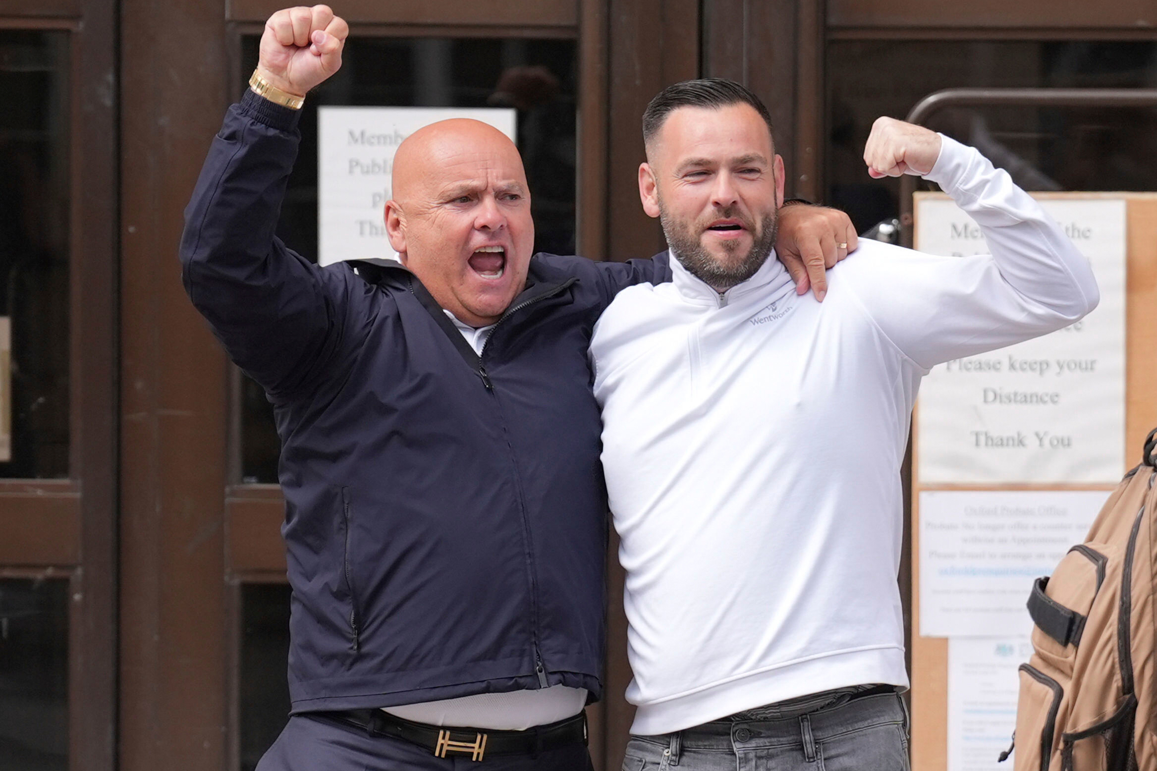 Frederick Doe, also known as Frederick Sines, right, with his father outside Oxford Crown Court in Oxford, England, Monday, May 19, 2025 after being sentenced to 21 months imprisonment suspended for two years and ordered to do 240 hours unpaid work, after he was found guilty of conspiracy to transfer criminal property, over the theft of a gold toilet from Blenheim Palace in 2019. (PA via AP)