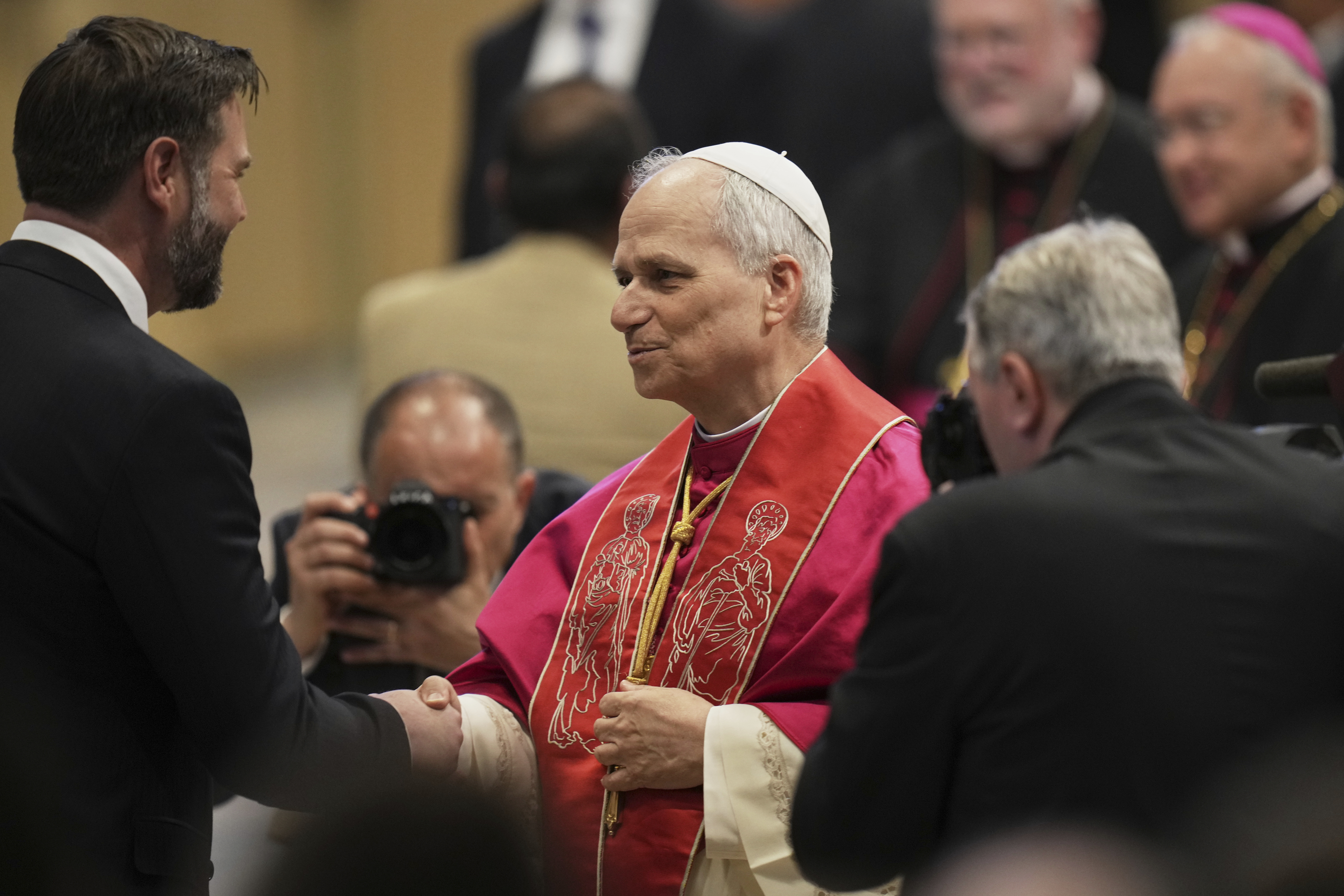 Pope Leo XIV's meets Vice President JD Vance after the formal inauguration of his pontificate in St. Peter's Square, at the Vatican, Sunday, May 18, 2025. (AP Photo/Alessandra Tarantino)