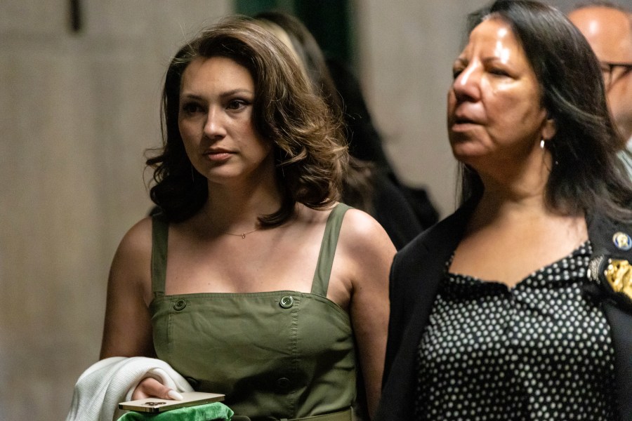 Actress Jessica Mann, left, arrives to testify in Harvey Weinstein's rape and sexual assault trial, Monday, May 19, 2025, in New York. (AP Photo/Stefan Jeremiah)