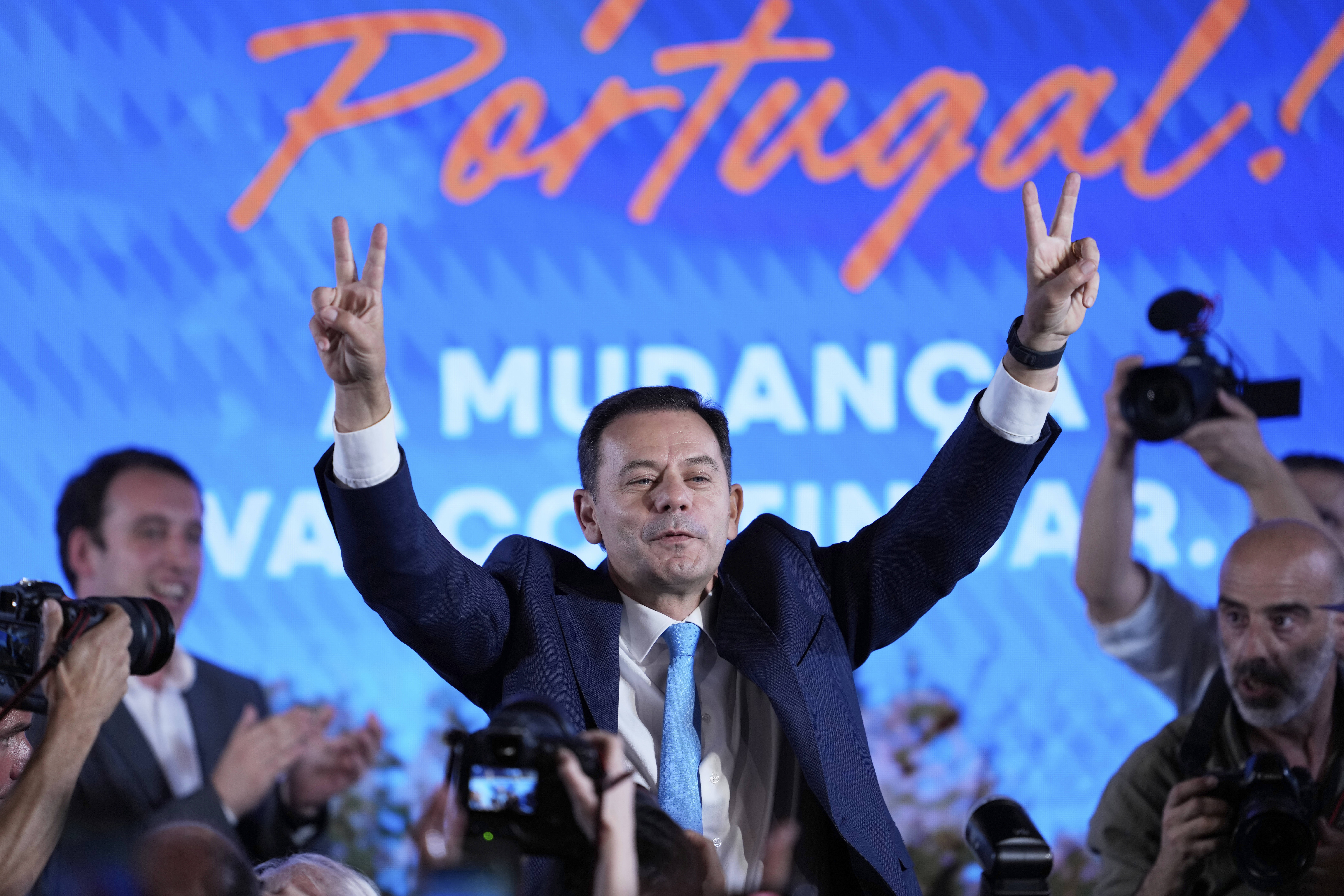 Incumbent Prime Minister and leader of the center-right Social Democratic Party Luis Montenegro gestures while addressing his supporters following Portugal's general election, in Lisbon, Monday, May 19, 2025. (AP Photo/Armando Franca)
