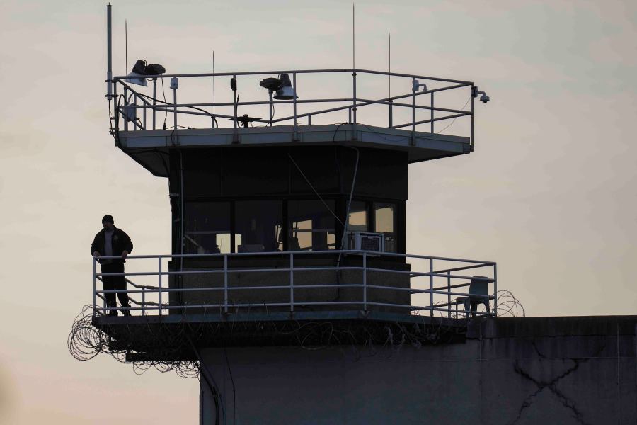 FILE - A guard stands in a tower at Indiana State Prison on Tuesday, Dec. 17, 2024, in Michigan City, Ind. (AP Photo/Erin Hooley, File)