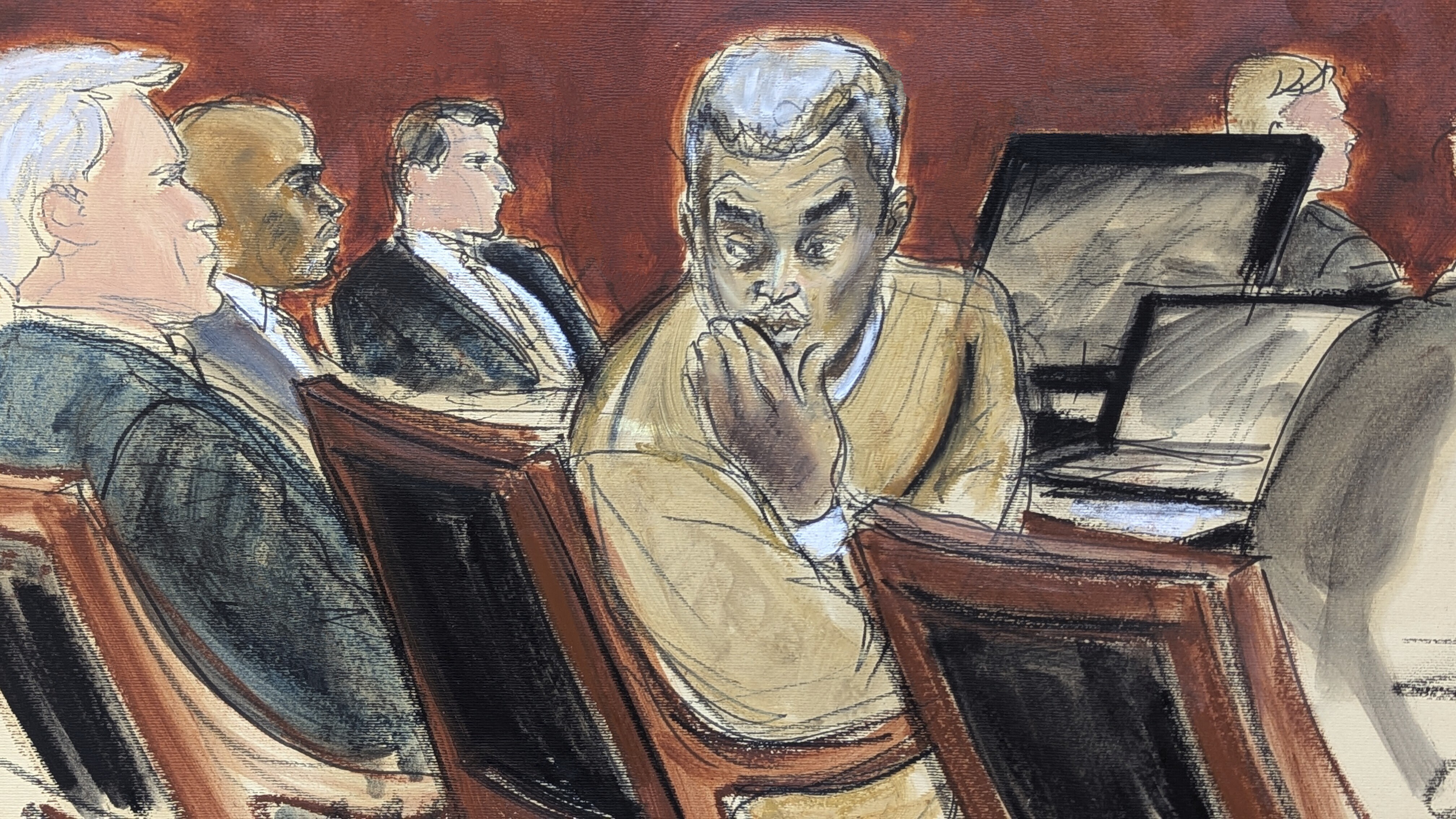 Sean "Diddy" Combs, right, blows kisses to people in the audience during his sex trafficking and racketeering trial in Manhattan federal court, Monday, May 19, 2025, in New York. (Elizabeth Williams via AP)