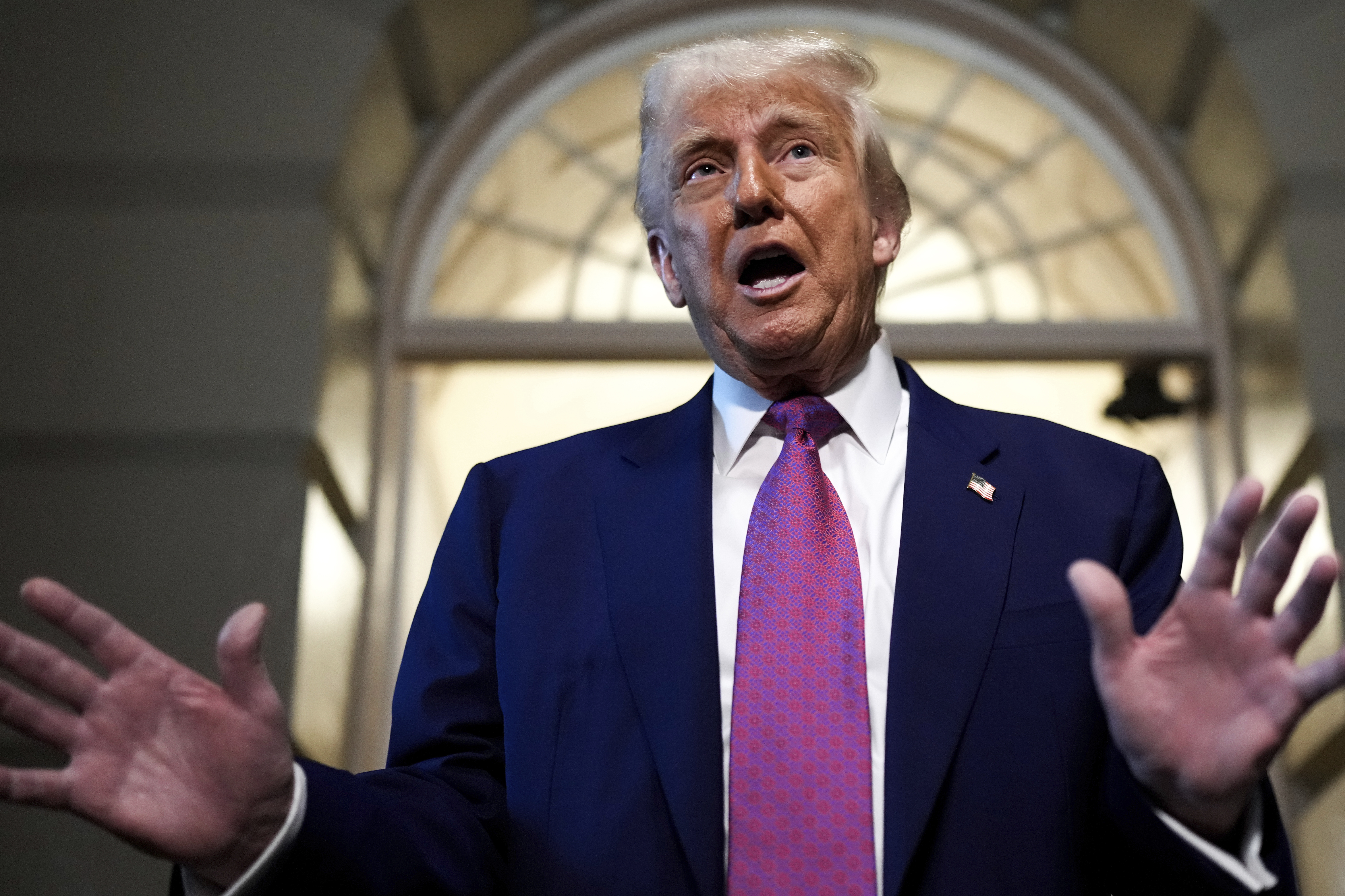 President Donald Trump speaks to reporters after departing a House Republican conference meeting, Tuesday, May 20, 2025, at the U.S. Capitol in Washington. (AP Photo/Julia Demaree Nikhinson)