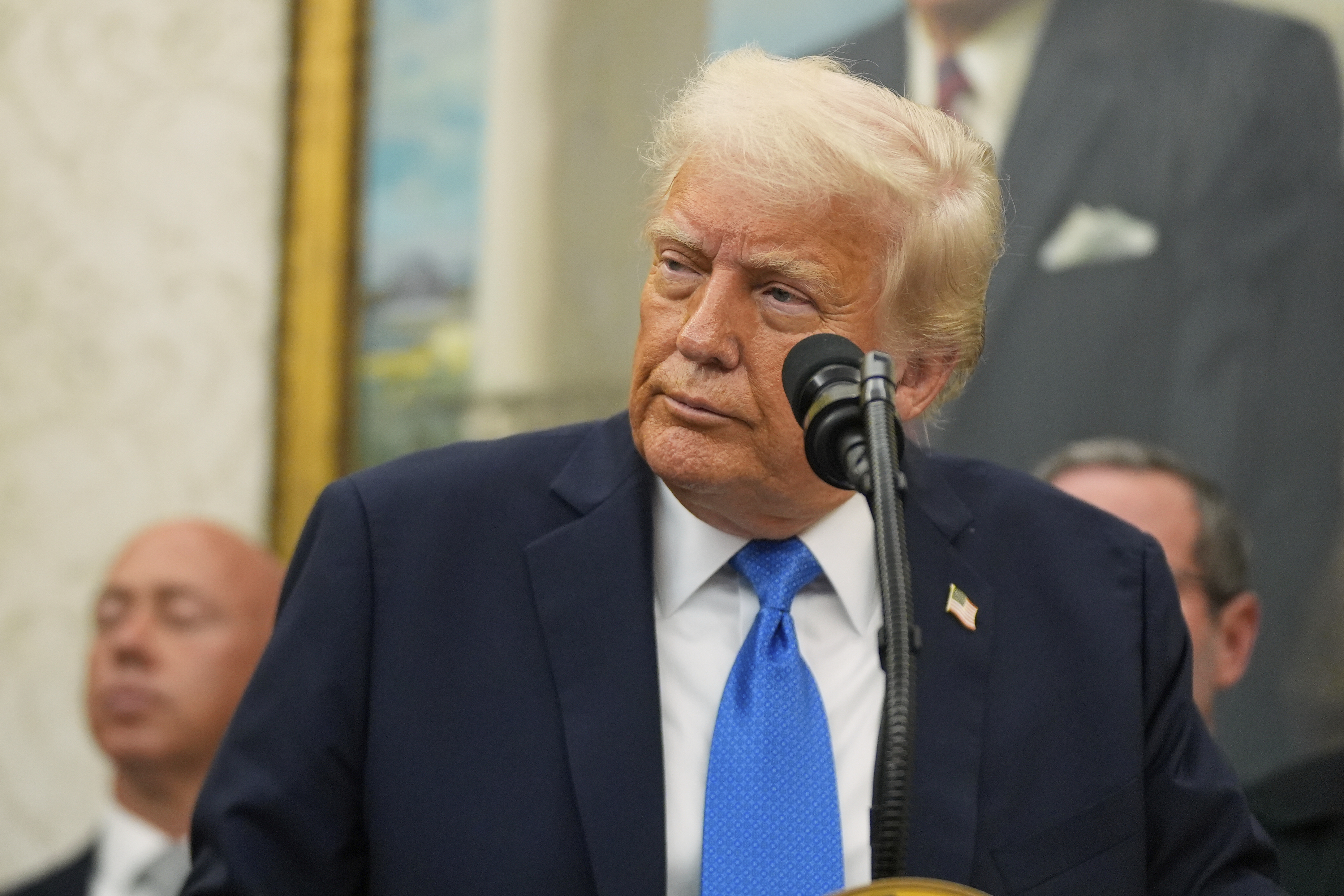 President Donald Trump listens to a question during an event to present law enforcement officers with an award in the Oval Office at the White House, Monday, May 19, 2025. (AP Photo/Manuel Balce Ceneta)