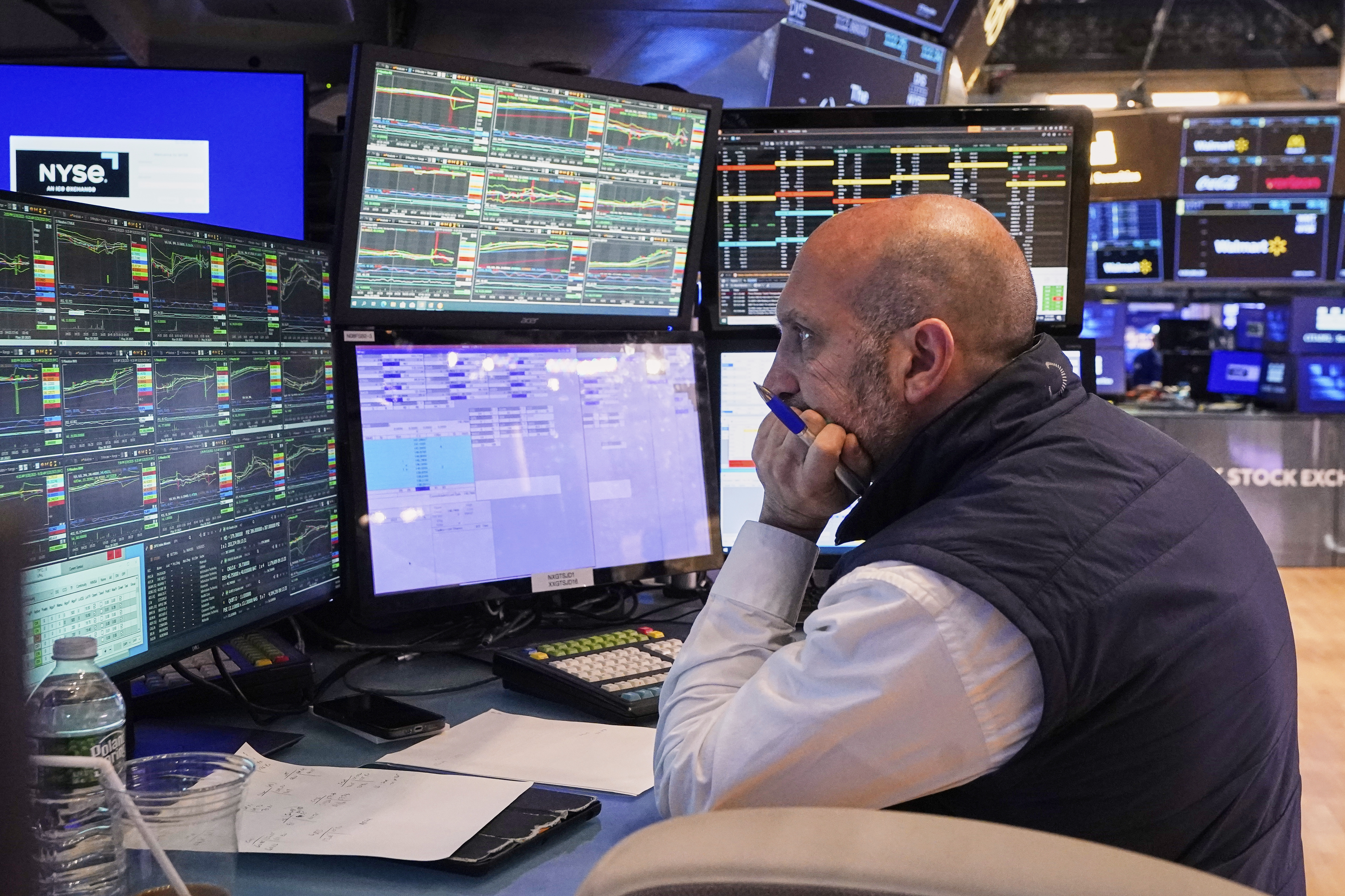 Specialist James Denaro works at his post on the floor of the New York Stock Exchange, Tuesday, May 20, 2025. (AP Photo/Richard Drew)