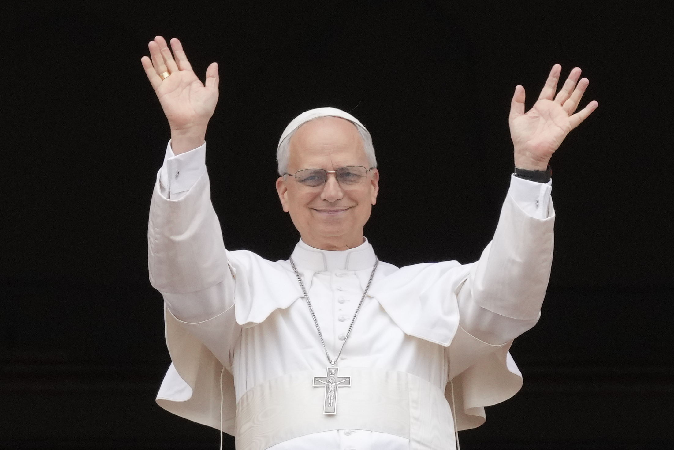 FILE - Pope Leo XIV appears at the central balcony of St. Peter's Basilica for his first Sunday blessing after his election, in St. Peter's Square at the Vatican, May 11, 2025.(AP Photo/Gregorio Borgia, File)
