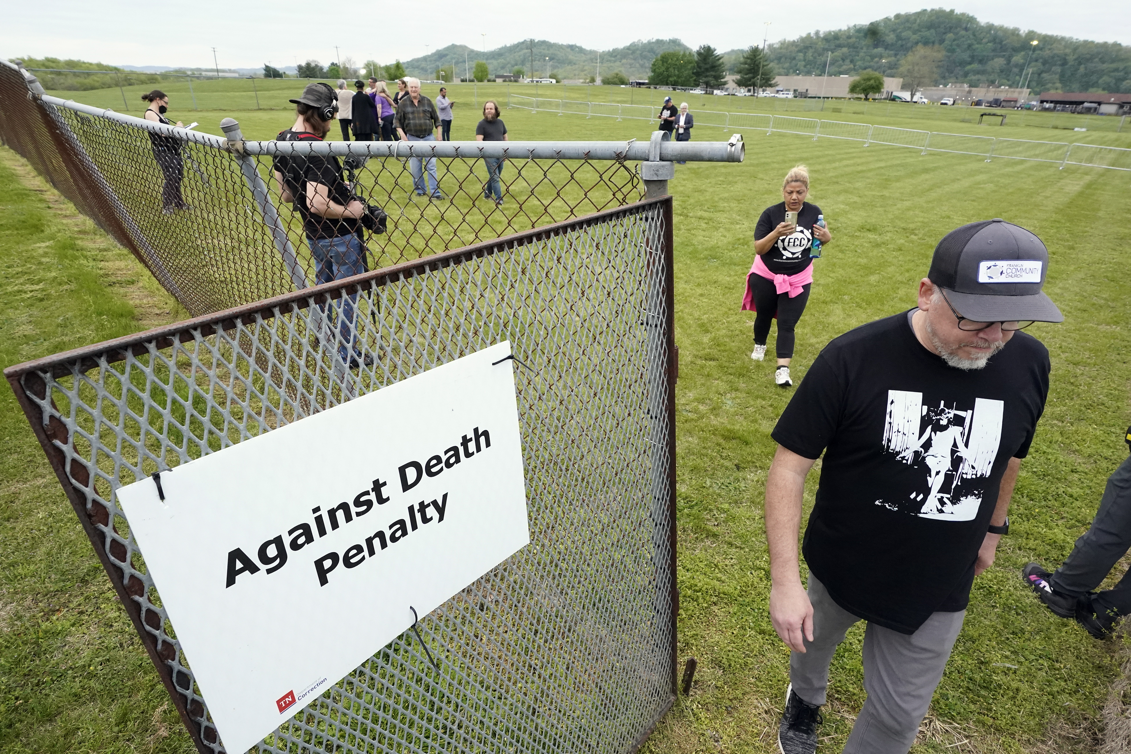 FILE - People leave the demonstration area set up for capital punishment protesters after an announcement was made that the scheduled execution of inmate Oscar Smith has been delayed, April 21, 2022, in Nashville, Tenn. (AP Photo/Mark Humphrey, File)