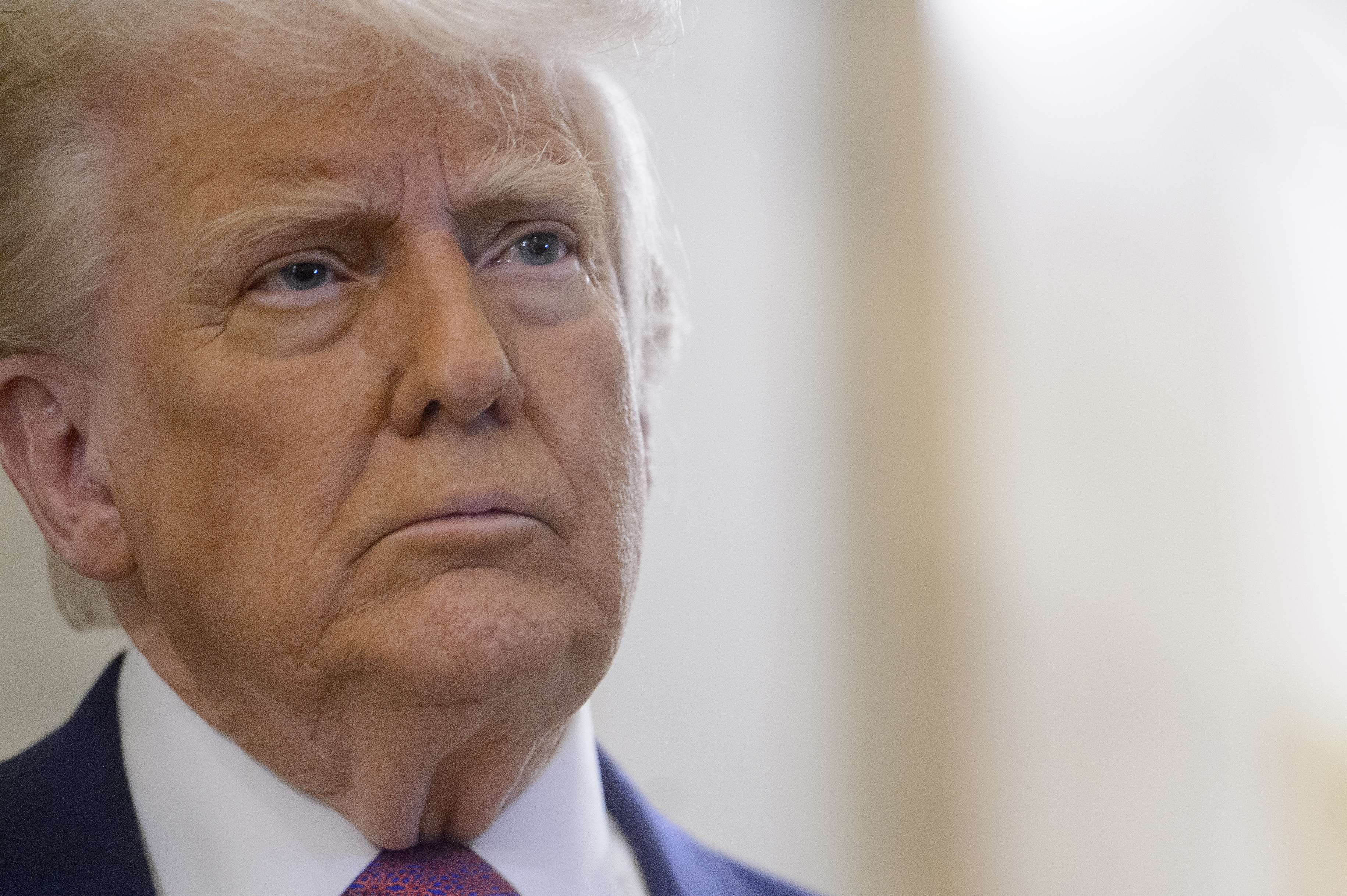 President Donald Trump speaks to reporters as he arrives for a meeting with the House Republican Conference at the Capitol, Tuesday, May 20, 2025, in Washington. (AP Photo/Rod Lamkey, Jr.)