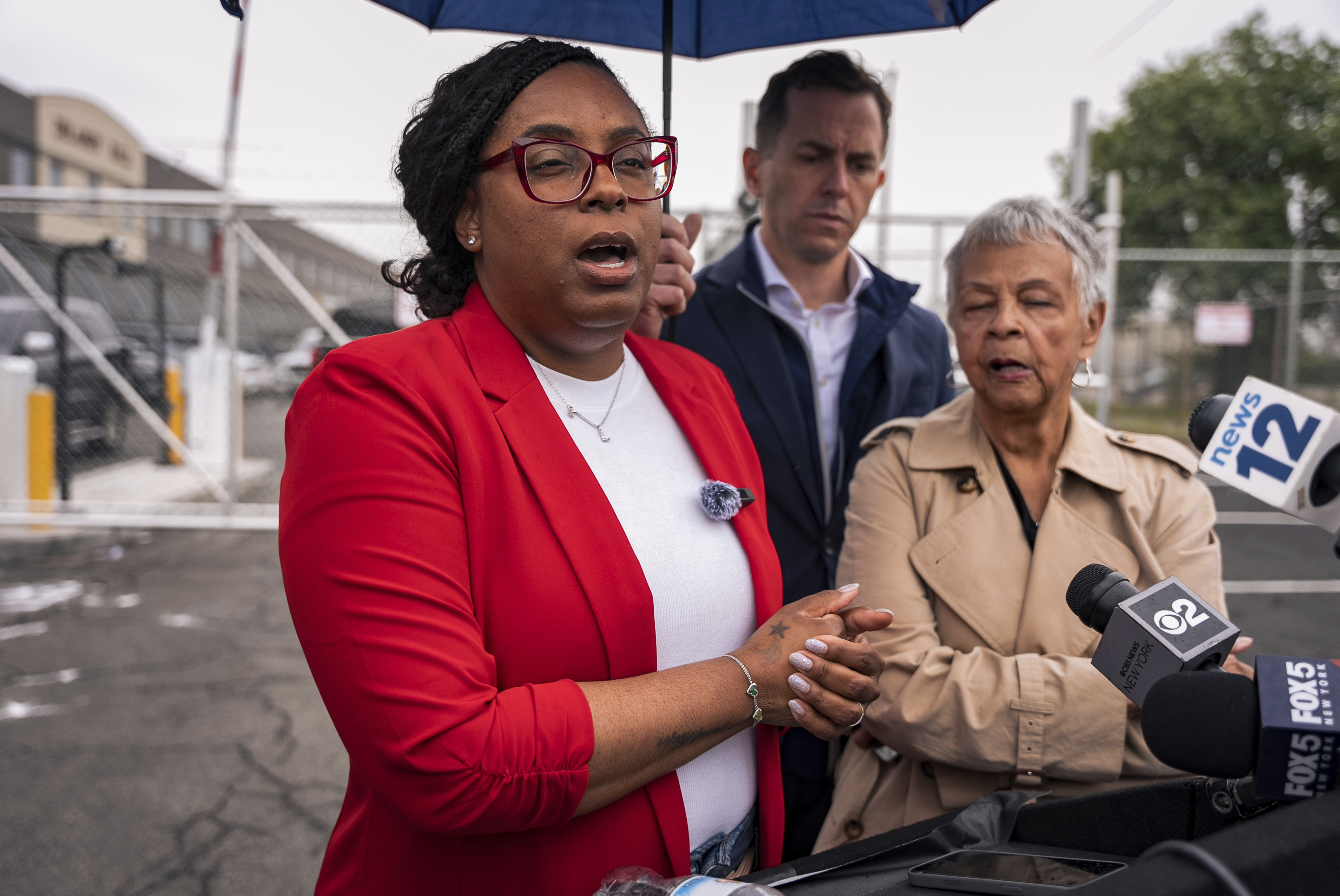 Congresswoman Rep. LaMonica McIver, D-N.J., speaks to the press after Newark mayor Ras Baraka was arrested while protesting at Delancey Hall ICE detention prison, Friday, May 9, 2025, in Newark, N.J, (AP Photo/Angelina Katsanis)