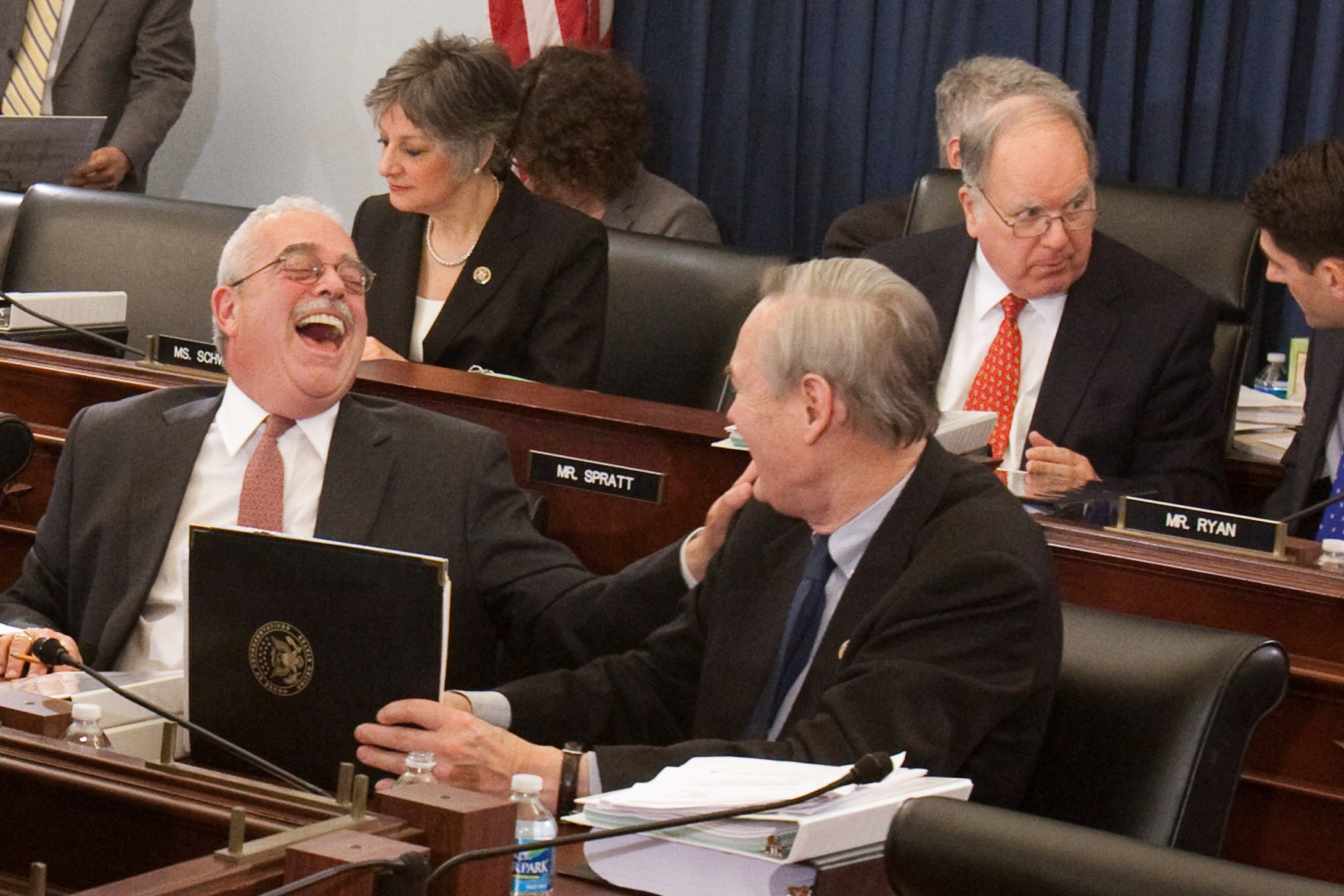 FILE - House Budget Committee member, Rep. Gerald Connolly, D-Va., foreground, left, has a laugh with fellow committee member Rep. Dennis Moore, D-Kan., on Capitol Hill in Washington, March 15, 2010. Connolly, a Democratic congressman and fixture of Virginia politics, has died at age 75. (AP Photo/Harry Hamburg, File)