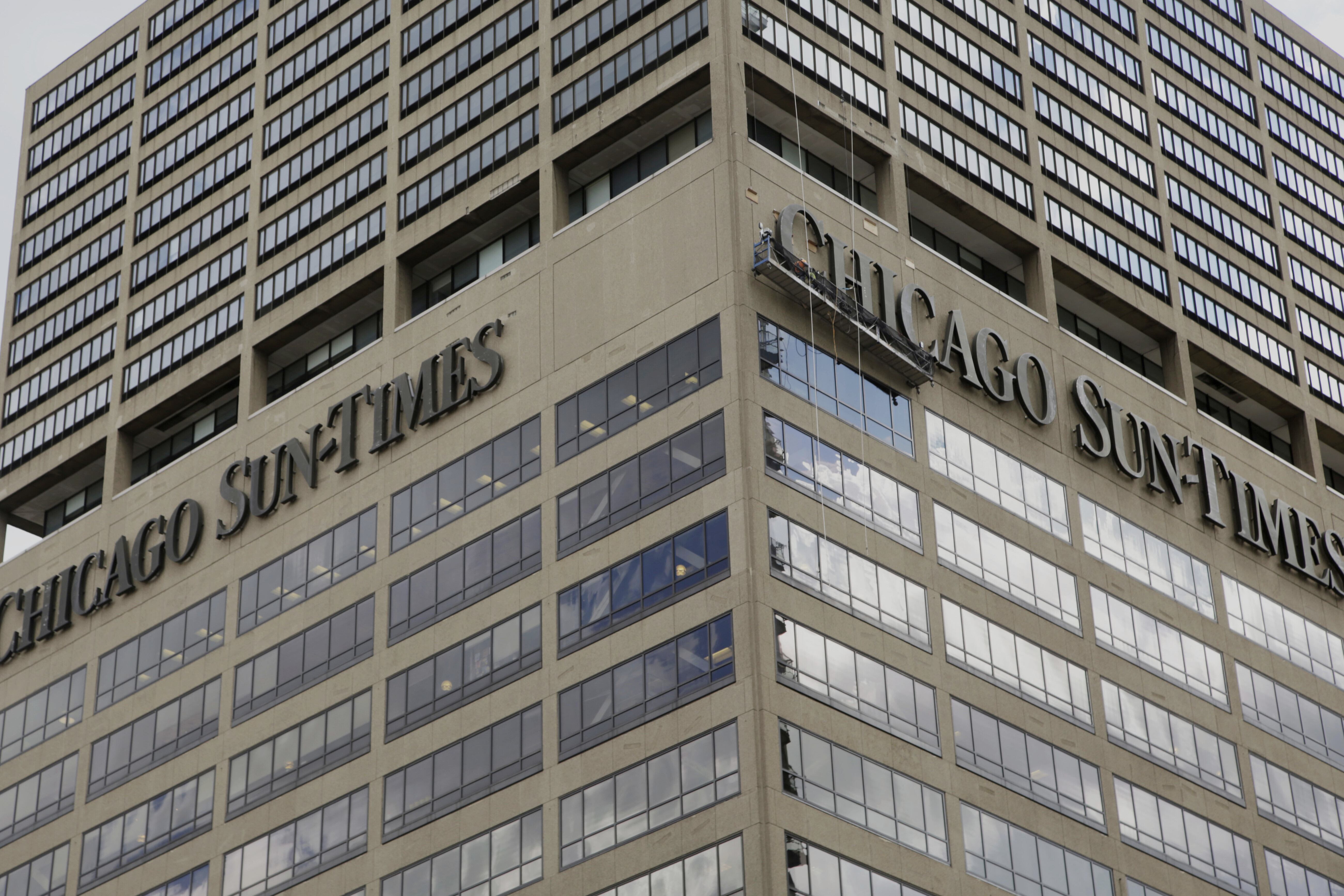 The building housing the Chicago Sun Times is seen Monday, June 19, 2017, in Chicago. (AP Photo/G-Jun Yam, File)