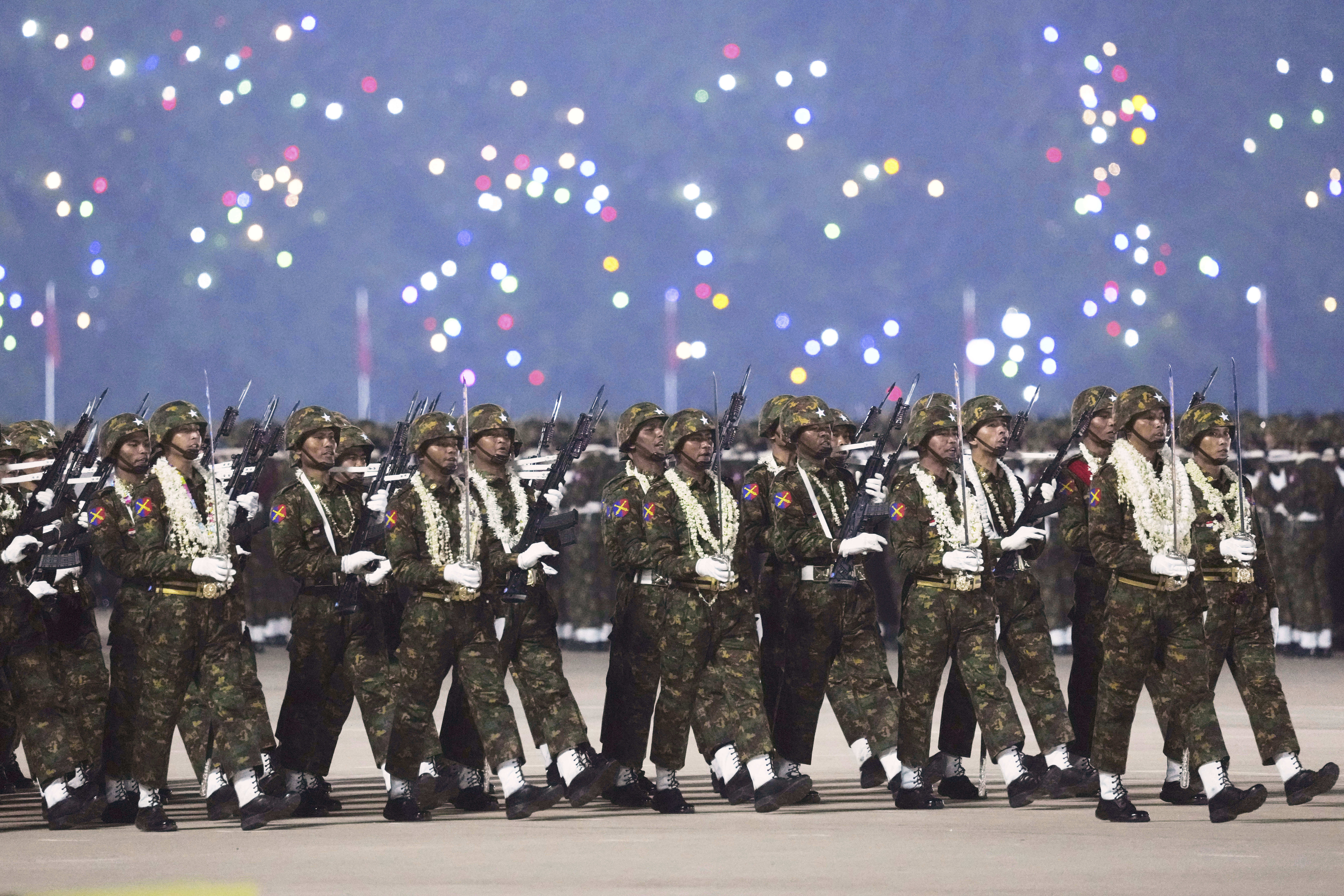 FILE - Military officers march during a parade to commemorate Myanmar's 80th Armed Forces Day in Naypyitaw, Myanmar, Thursday, March 27, 2025. (AP Photo/Aung Shine Oo, File)