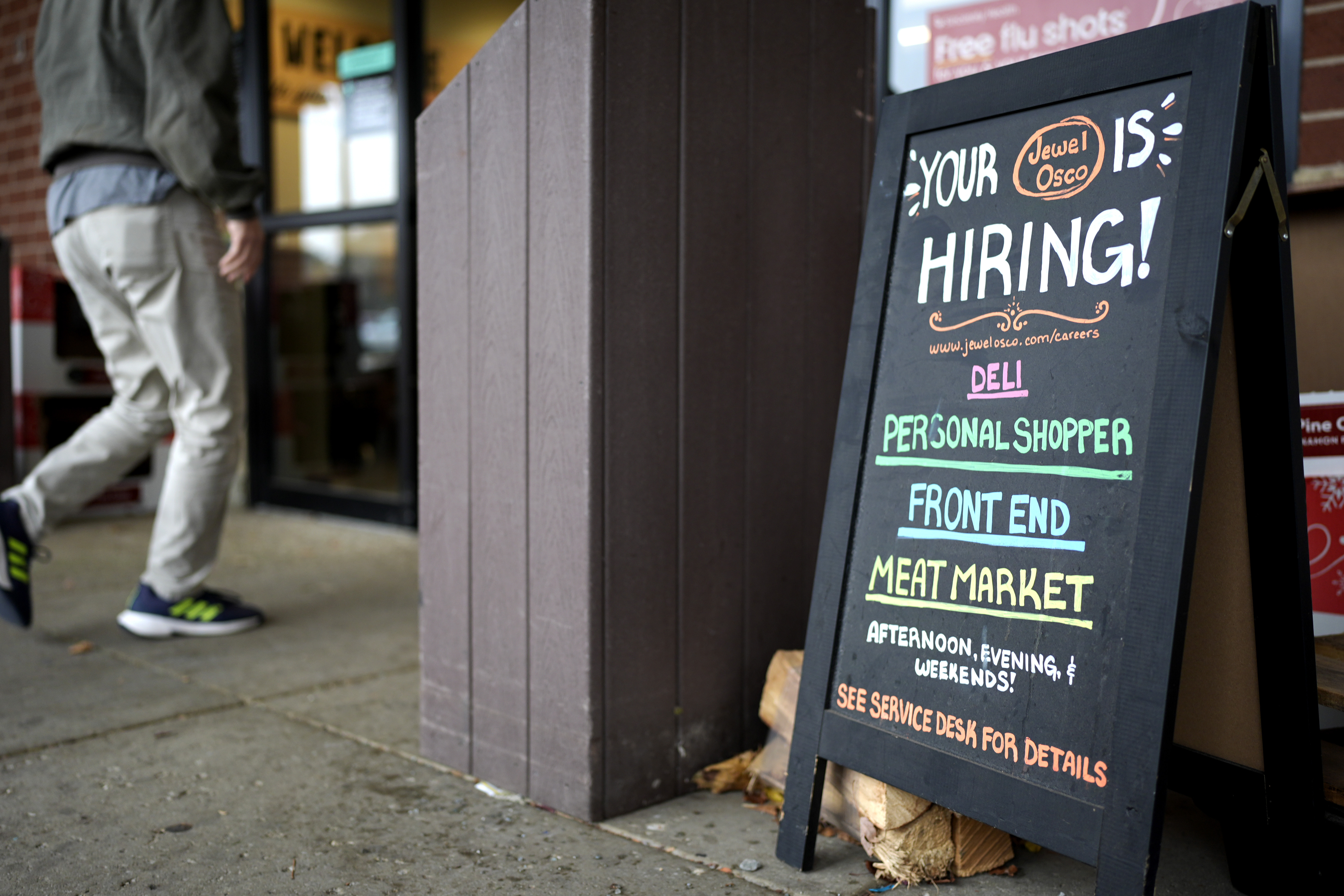 FILE - A hiring sign is displayed at a grocery store in Glenview, Ill., Monday, Nov. 25, 2024. (AP Photo/Nam Y. Huh, File)