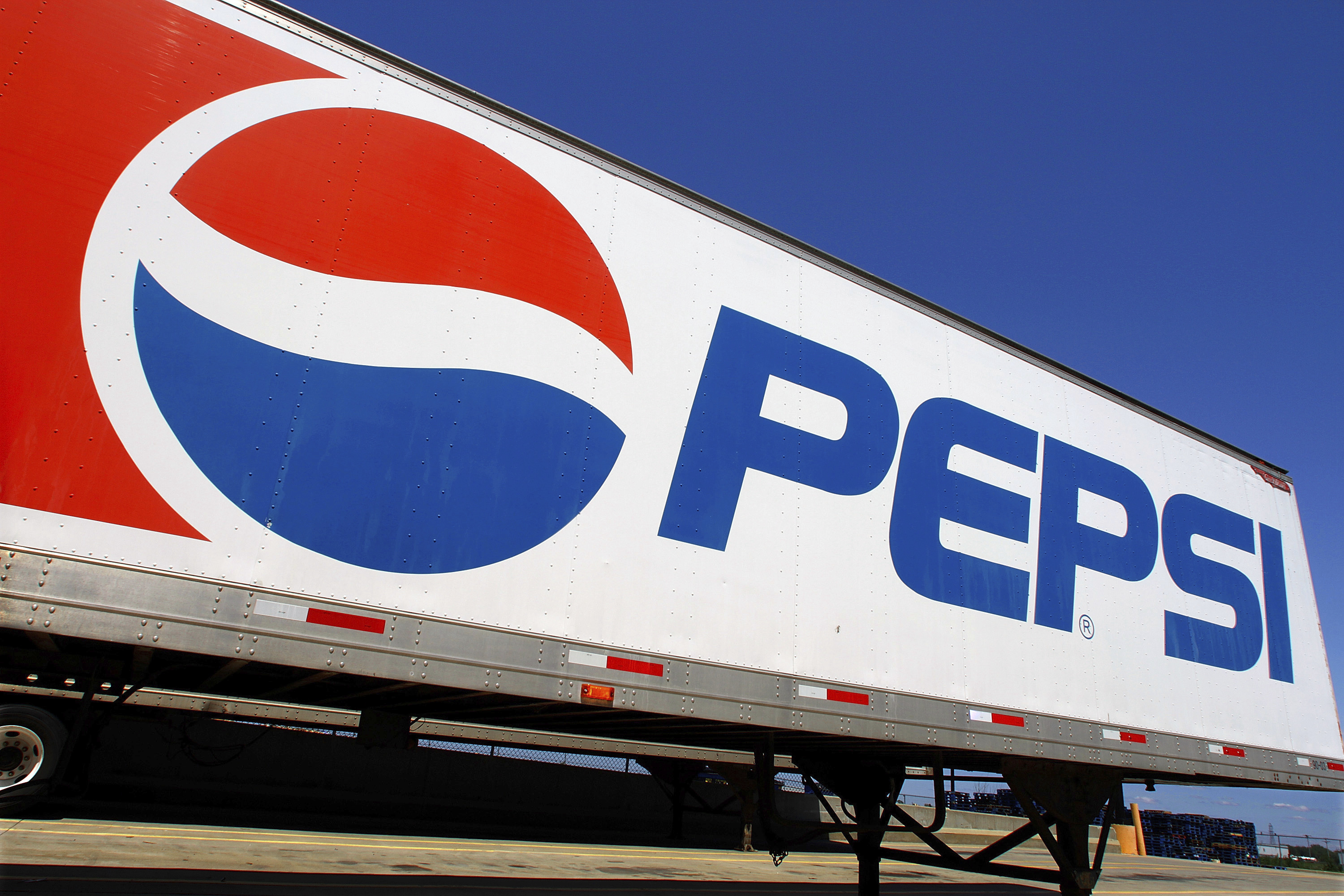 FILE - In this photo taken May 16, 2011, the Pepsi logo is seen on a delivery truck at Walmart in Springfield, Ill. (AP Photo/Seth Perlman, File)
