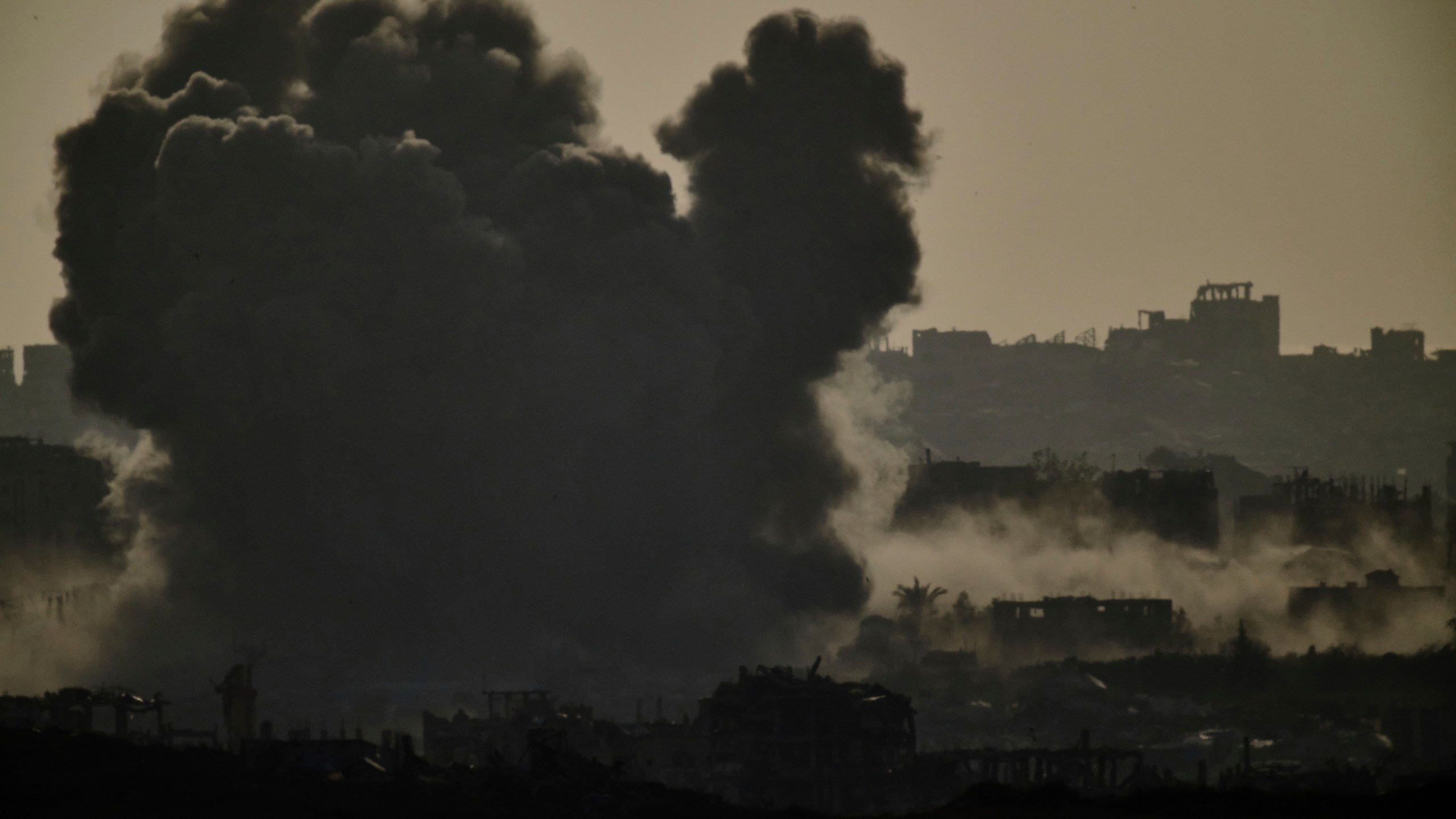Smoke rises to the sky following an Israeli bombardment in the Gaza Strip as seen from southern Israel, Thursday, May 22, 2025. (AP Photo/Leo Correa)