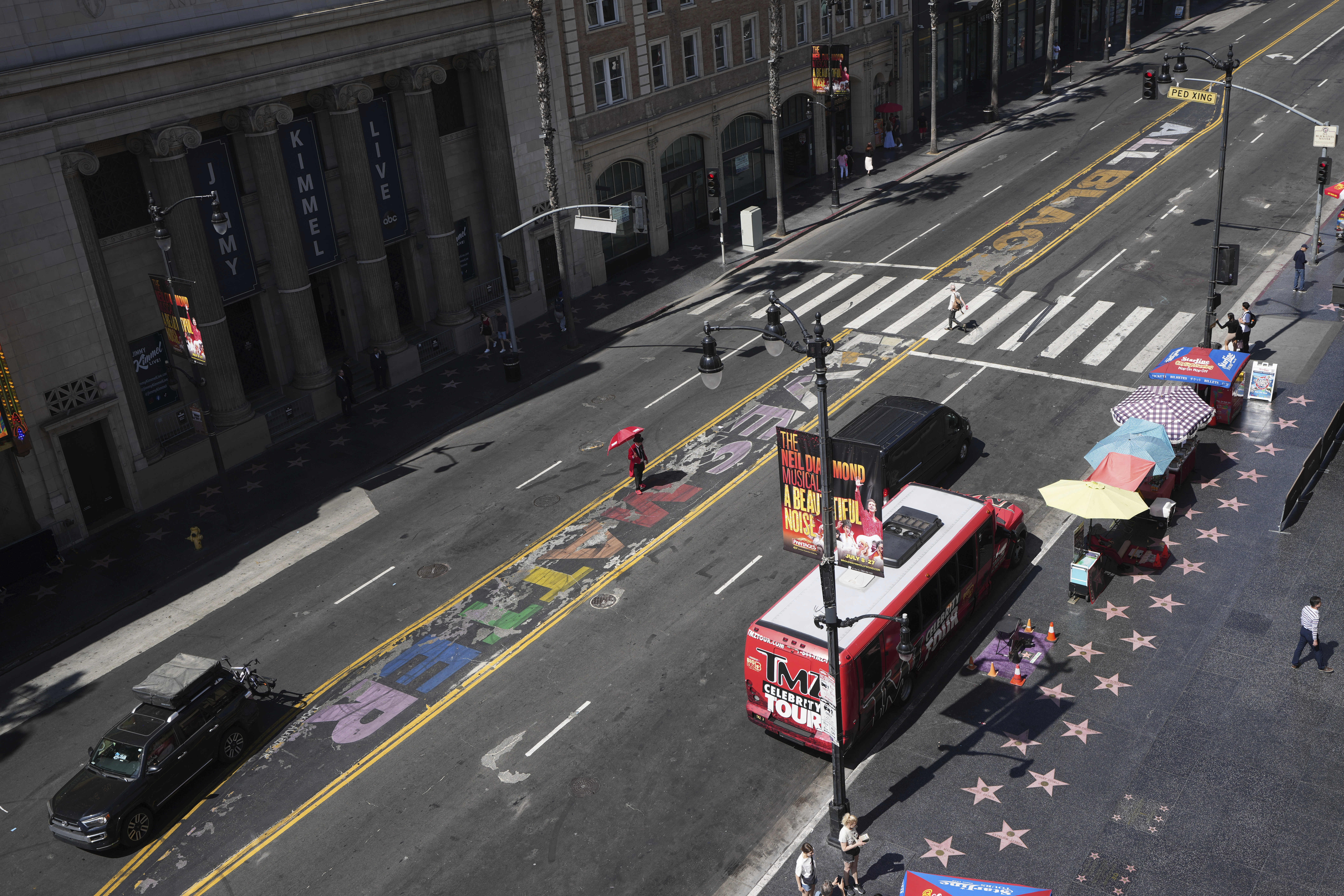 A sign reads "All Black Lives Matter" as part of an art installation Tuesday, May 20, 2025, in the Hollywood section of Los Angeles. (AP Photo/Damian Dovarganes)